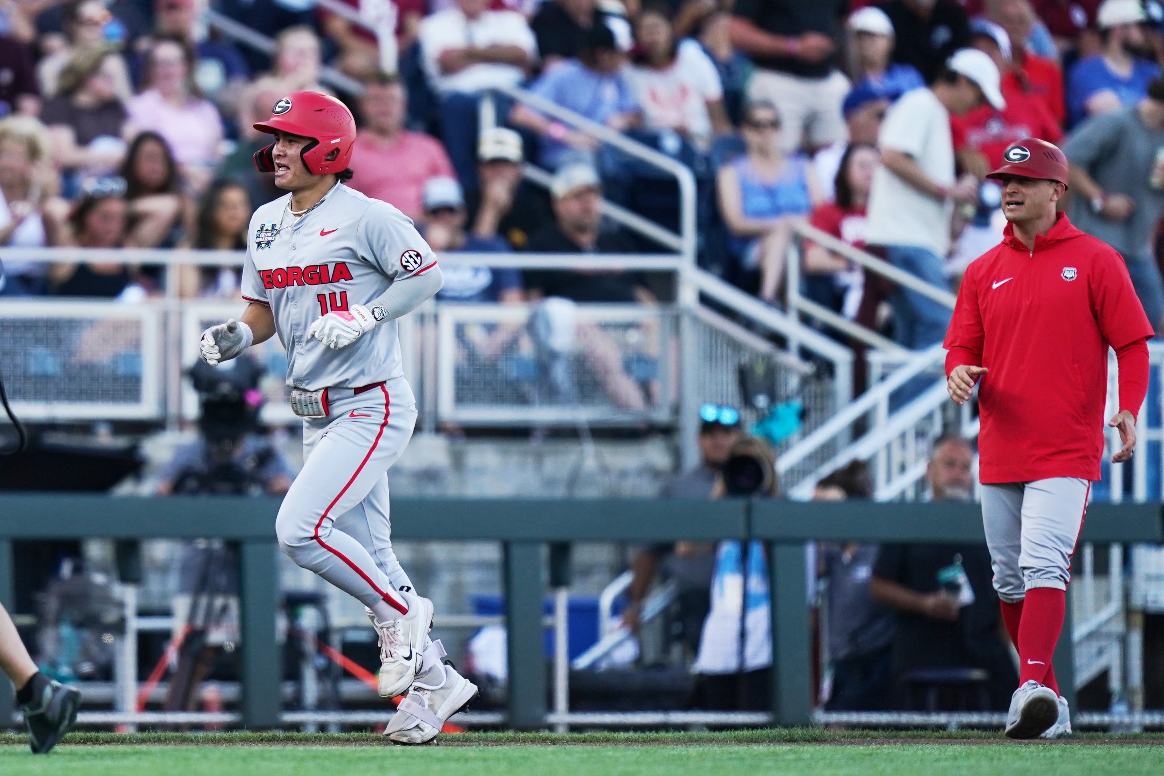 Georgia utility player Kenny Ishikawa rounds the bases after hitting a homer during a College World Series game against Oklahoma on Monday, June 15, 2026, in Omaha, Neb. (Vera Nieuwenhuis/AP)