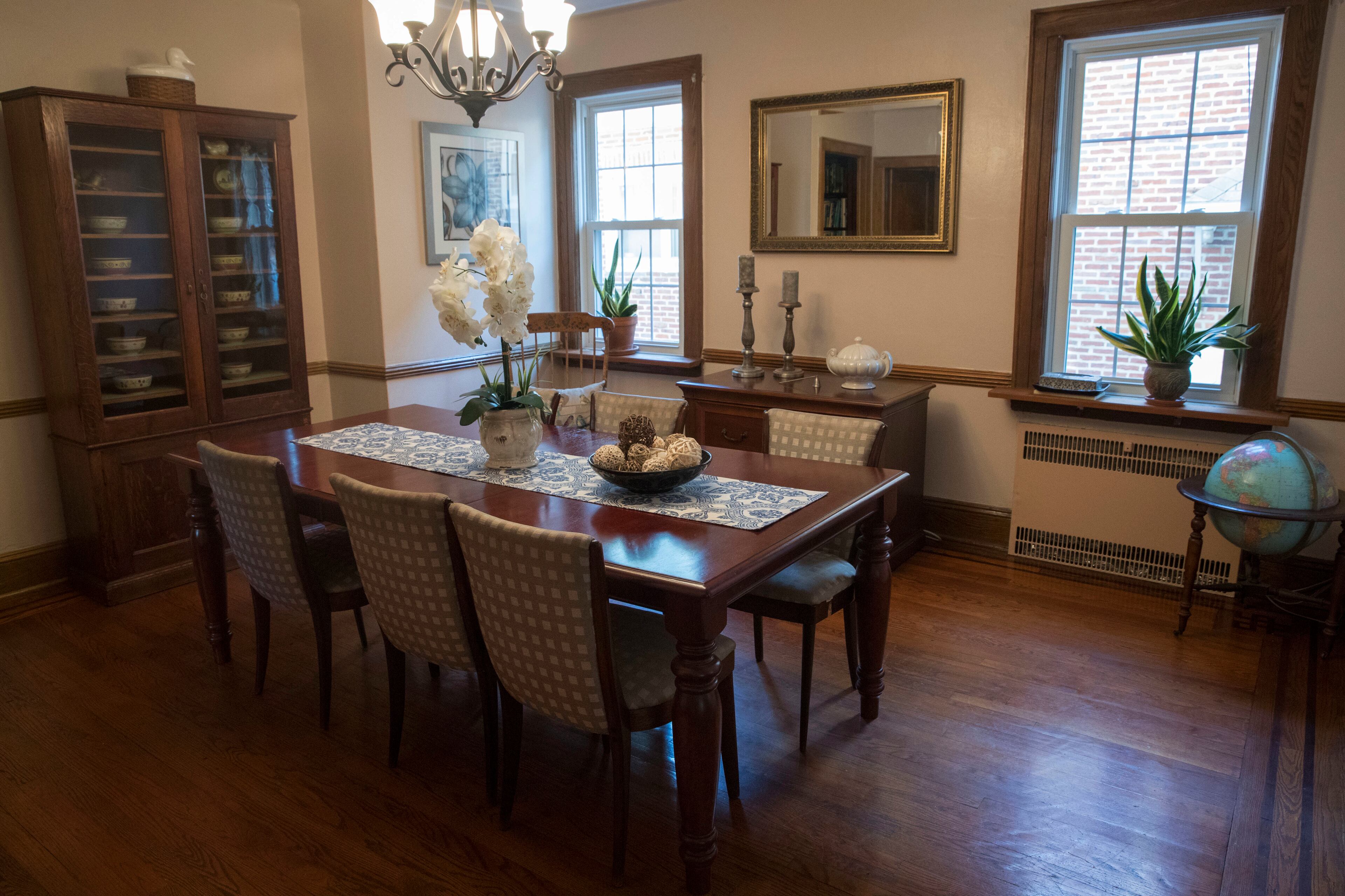 This Tuesday, Oct. 18, 2016 photo, shows the dining room in the house where Republican presidential candidate Donald Trump spent time in the Jamaica Estates neighborhood of the Queens borough of New York. Trump's first boyhood home in New York City is going on the auction block with an opening bid of $849,000. (AP Photo/Mary Altaffer)