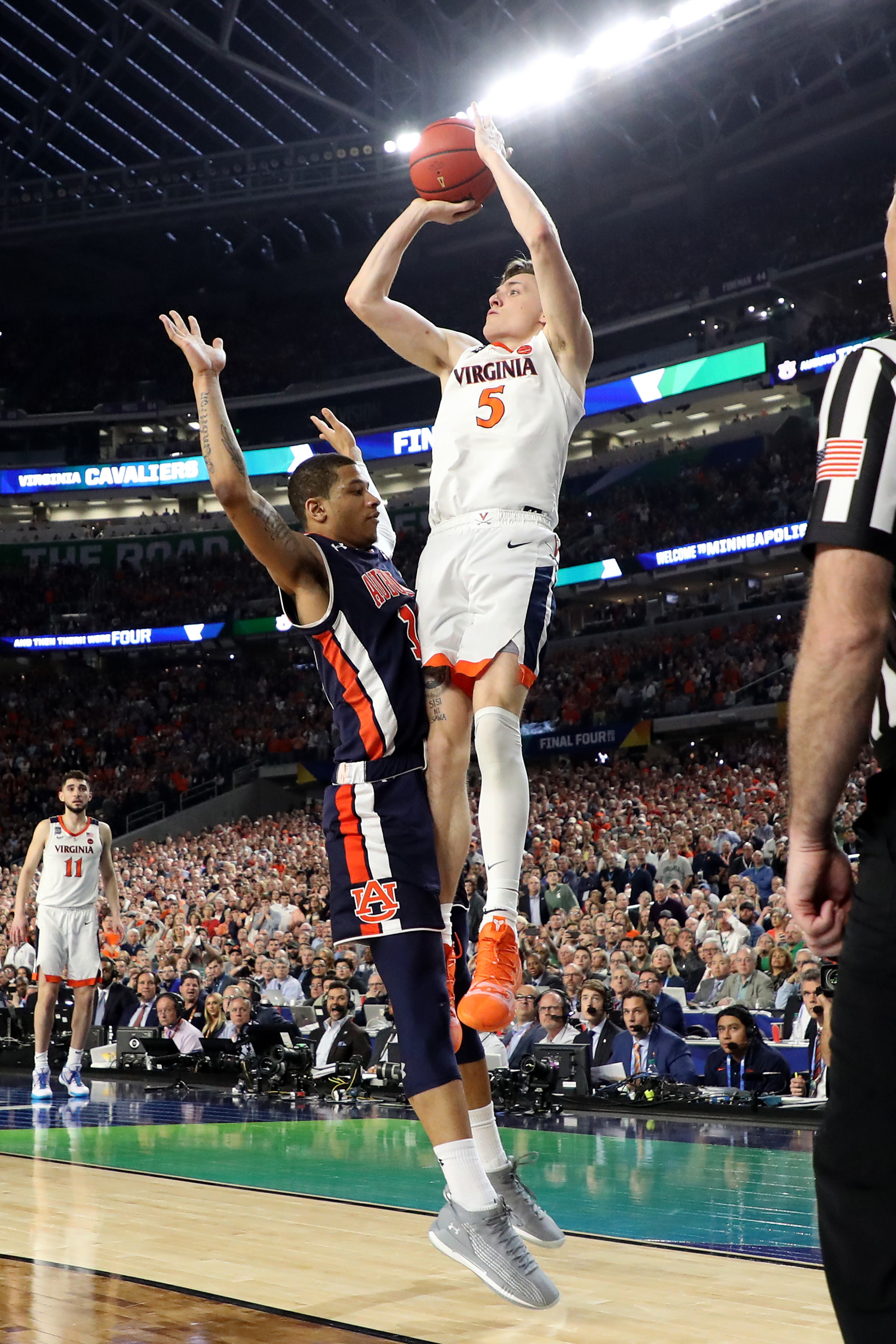 With his team down by two points, Kyle Guy of Virginia attempted a three-pointer as time expired. A foul was called on Auburn's Samir Doughty. Guy made all three free throws and the Cavs advanced to the national championship game. (Photo by Streeter Lecka/Getty Images)