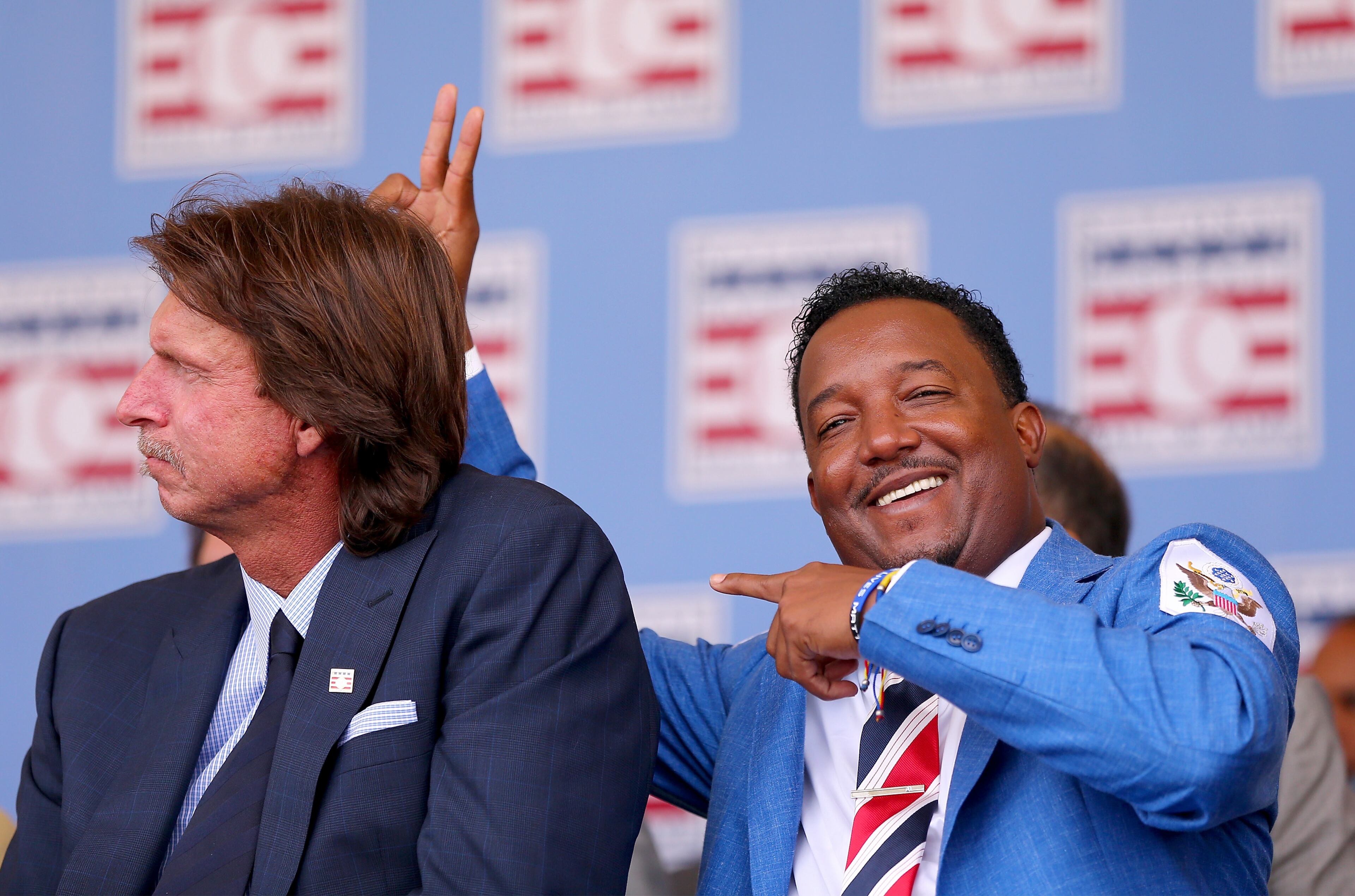COOPERSTOWN, NY - JULY 26: Randy Johnson and Pedro Martinez enjoy the Hall of Fame Induction Ceremony at National Baseball Hall of Fame on July 26, 2015 in Cooperstown, New York.Johnson was inducted with Pedro Martinez;Craig Biggio and John Smoltz (Photo by Elsa/Getty Images)