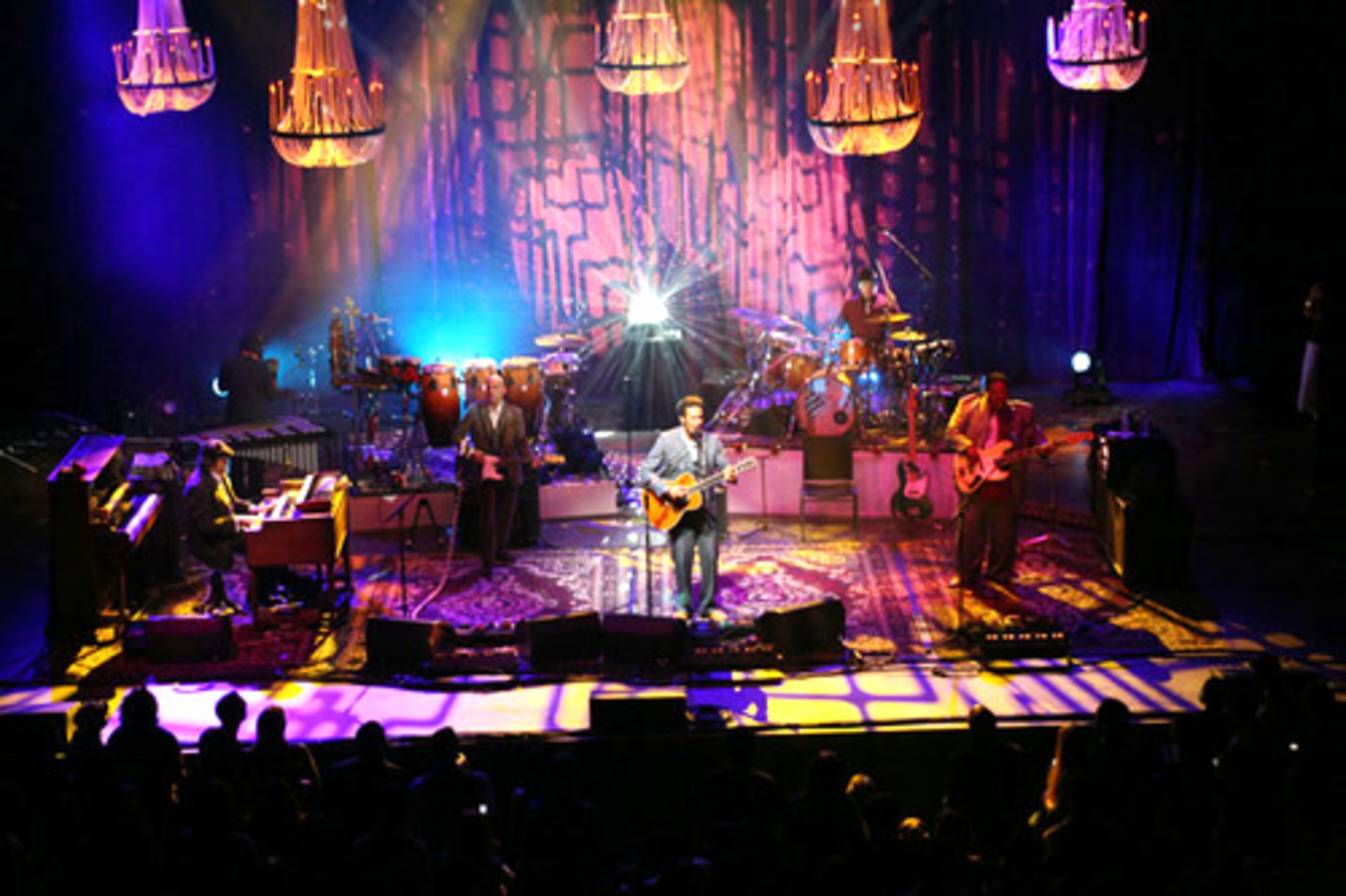 The Innocent Criminals are Oliver Charles (drums), Juan Nelson (bass), Leon Mobley (percussion), Michael Ward (guitar), and Jason Yates (keyboards).