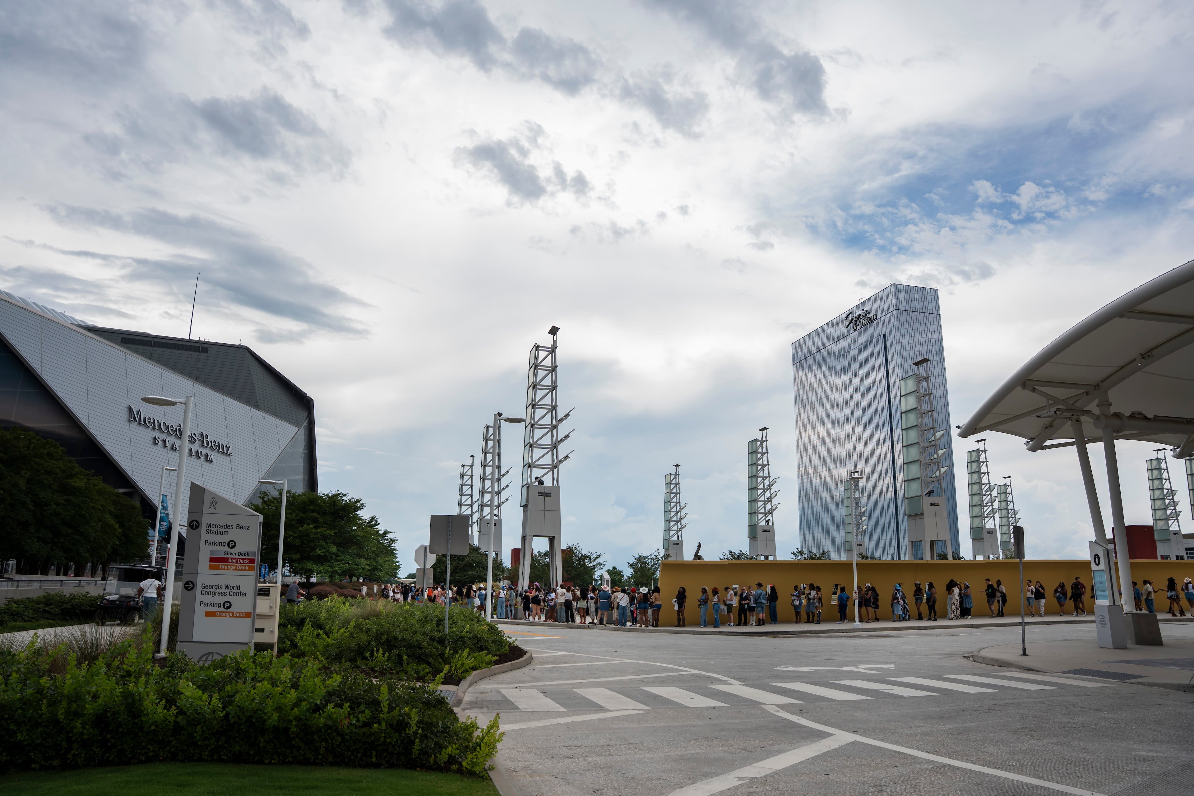 Fans wait in line outside Beyonce's Cowboy Carter concert in Atlanta on Thursday, July 10, 2025. (Olivia Bowdoin for the AJC).