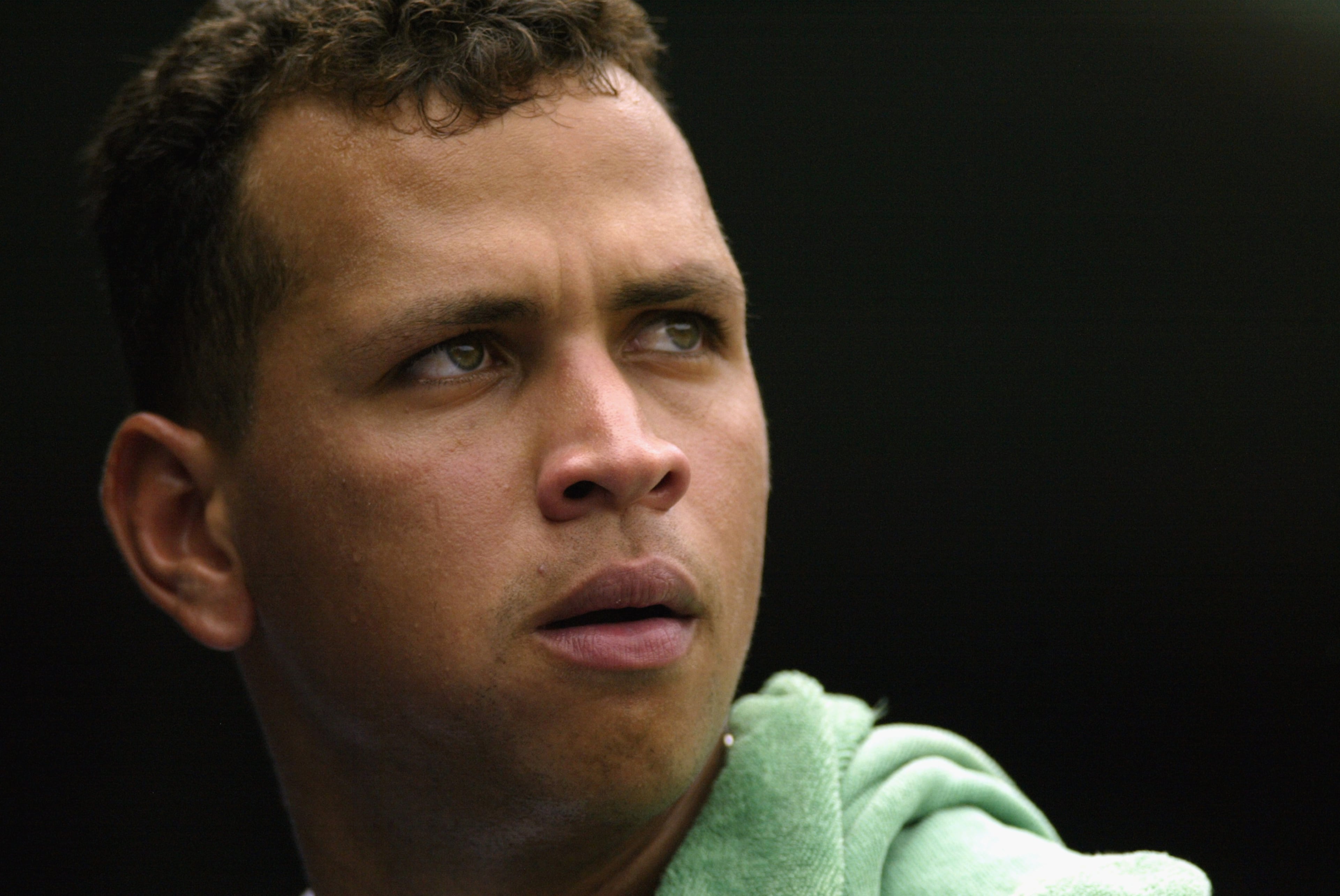 2002: Shortstop Alex Rodriguz #3 of the Texas Rangers stands in the dugout during the MLB game against the Seattle Mariners on September 12, 2002 at the Ballpark in Arlington, Texas. The Rangers defeated the Mariners 7-3. (Photo by Ronald Martinez/Getty Images)