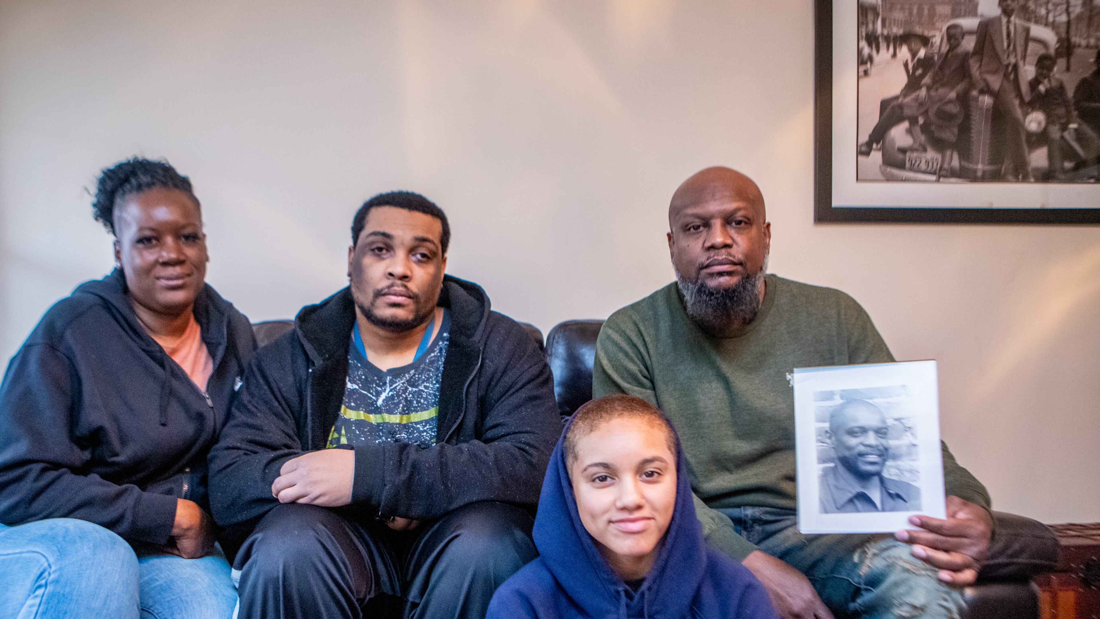 The family of Eugene Evans is still mourning his death in the Clayton County Jail last year. Eugene's children and grandchildren including, daughter Aneesah Weaver, from left, son Jamal Evans, granddaughter Brianna Evans and son Almin Evans, gathered in Stockbridge on Dec. 11 to remember him. (Jenni Girtman for The Atlanta Journal-Constitution)