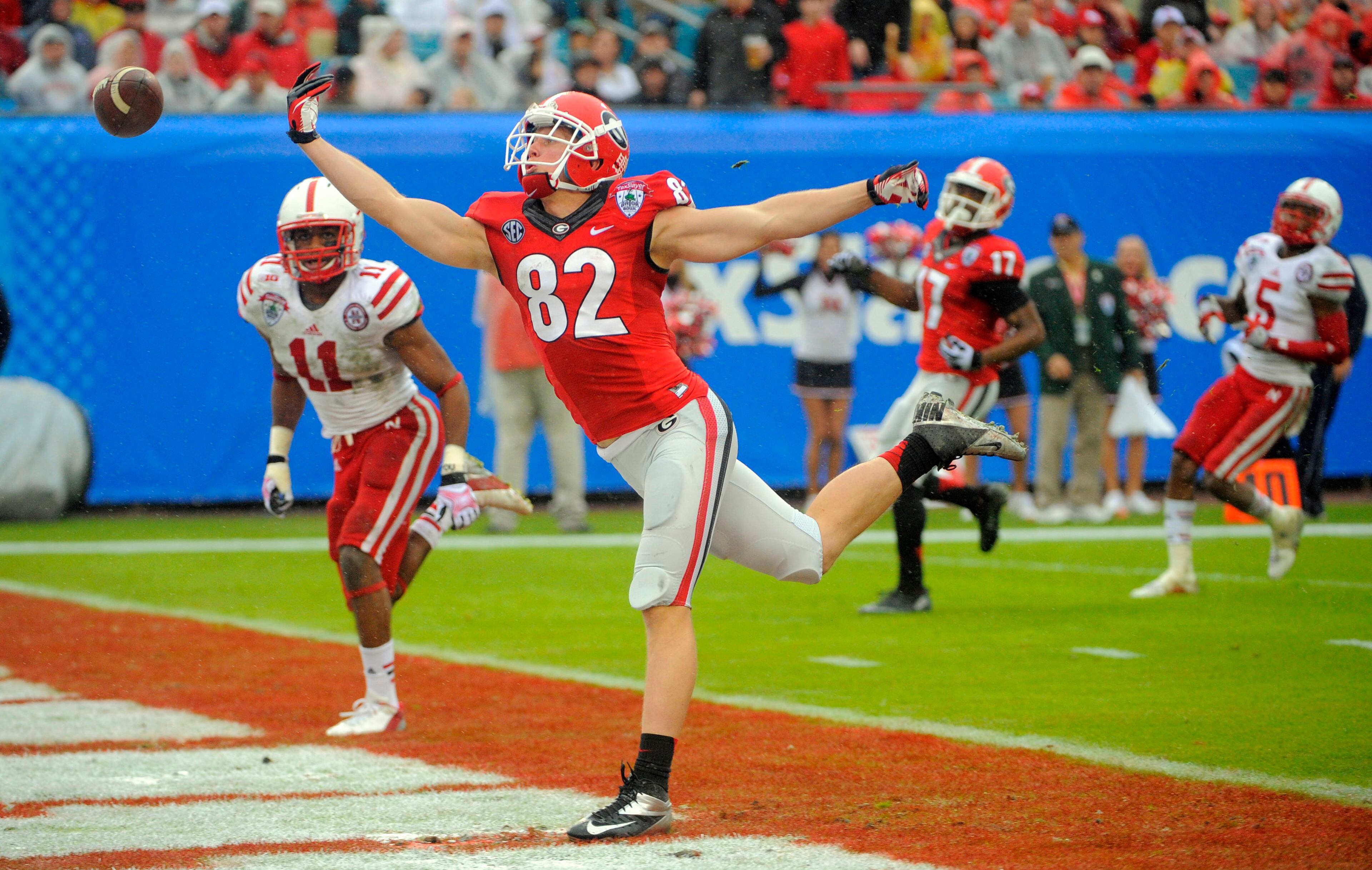 Georgia wide receiver Michael Bennett (82) misses a pass in the endzone during the second half of the Gator Bowl NCAA college football game against Nebraska, Wednesday, Jan. 1, 2014, in Jacksonville, Fla. Nebraska beat Georgia 24-19. (AP Photo/Stephen B. Morton)