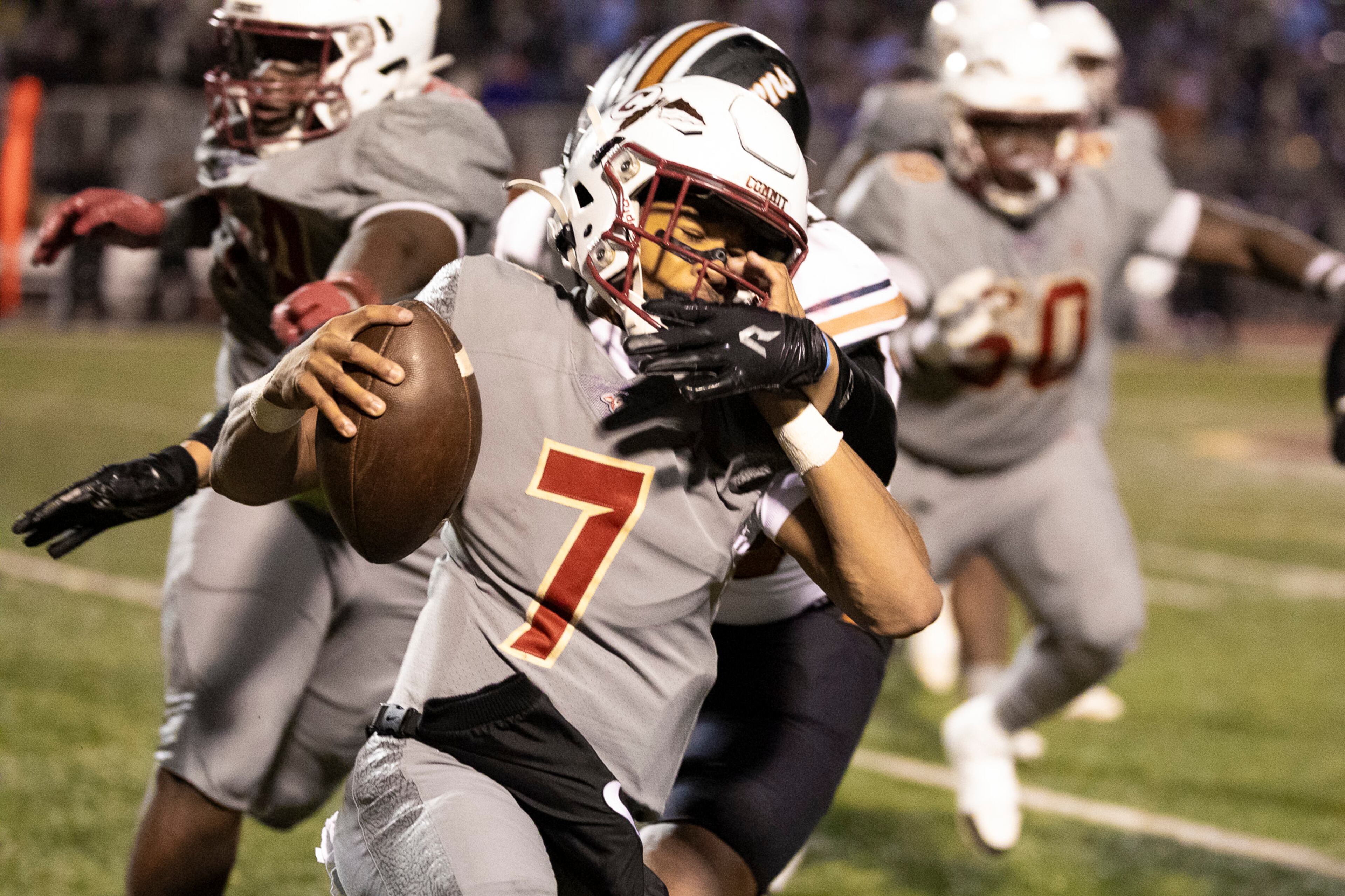Creekside quarterback Cayden Benson gets tackled during the Class 4A semifinal against Kell on Friday, Dec. 5, 2025, at Creekside High School in Fairburn. (Oscar Guevara Saenz for the AJC)