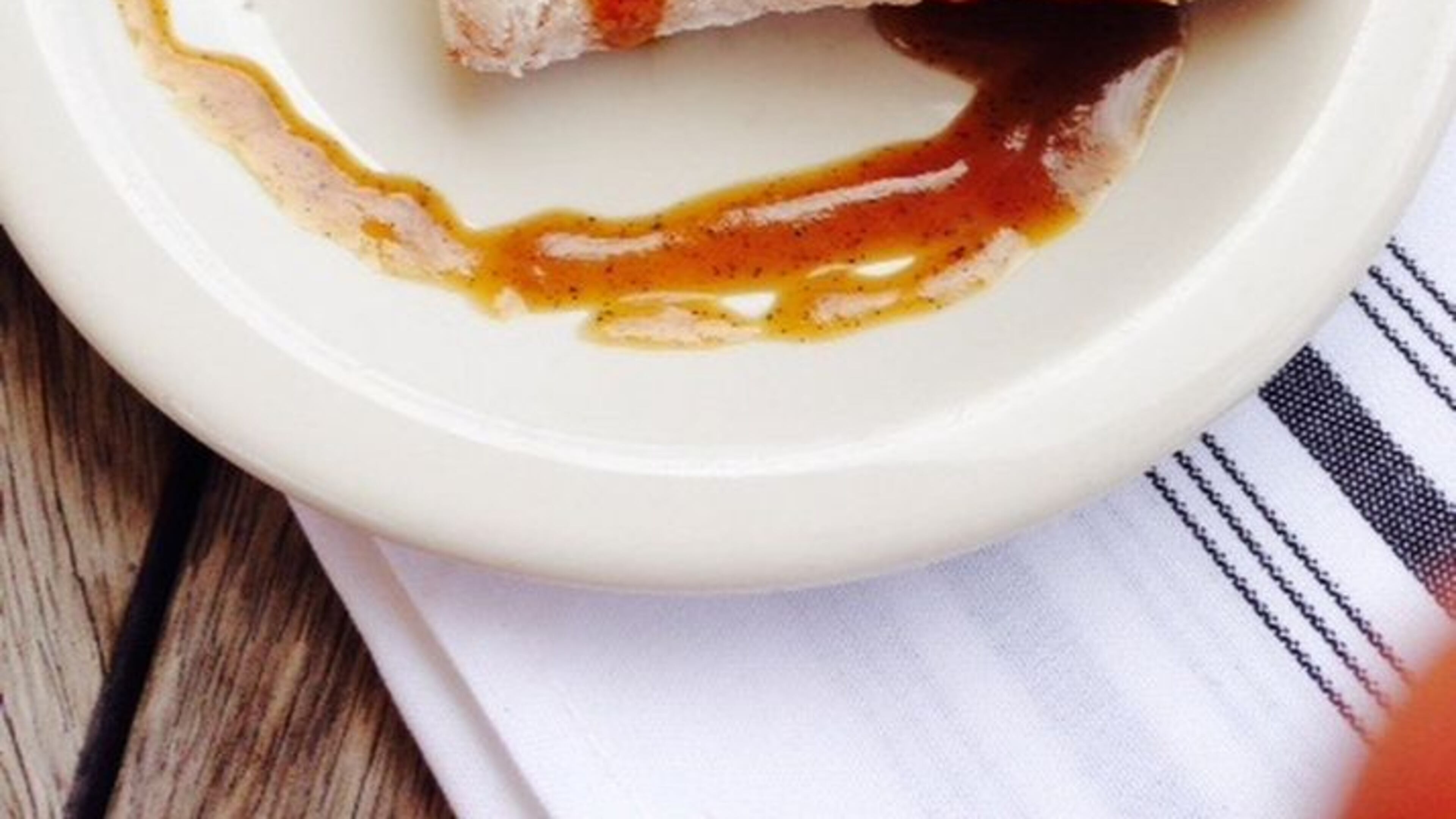 Watershed’s beignets are topped with sauce. (Green Olive Media)