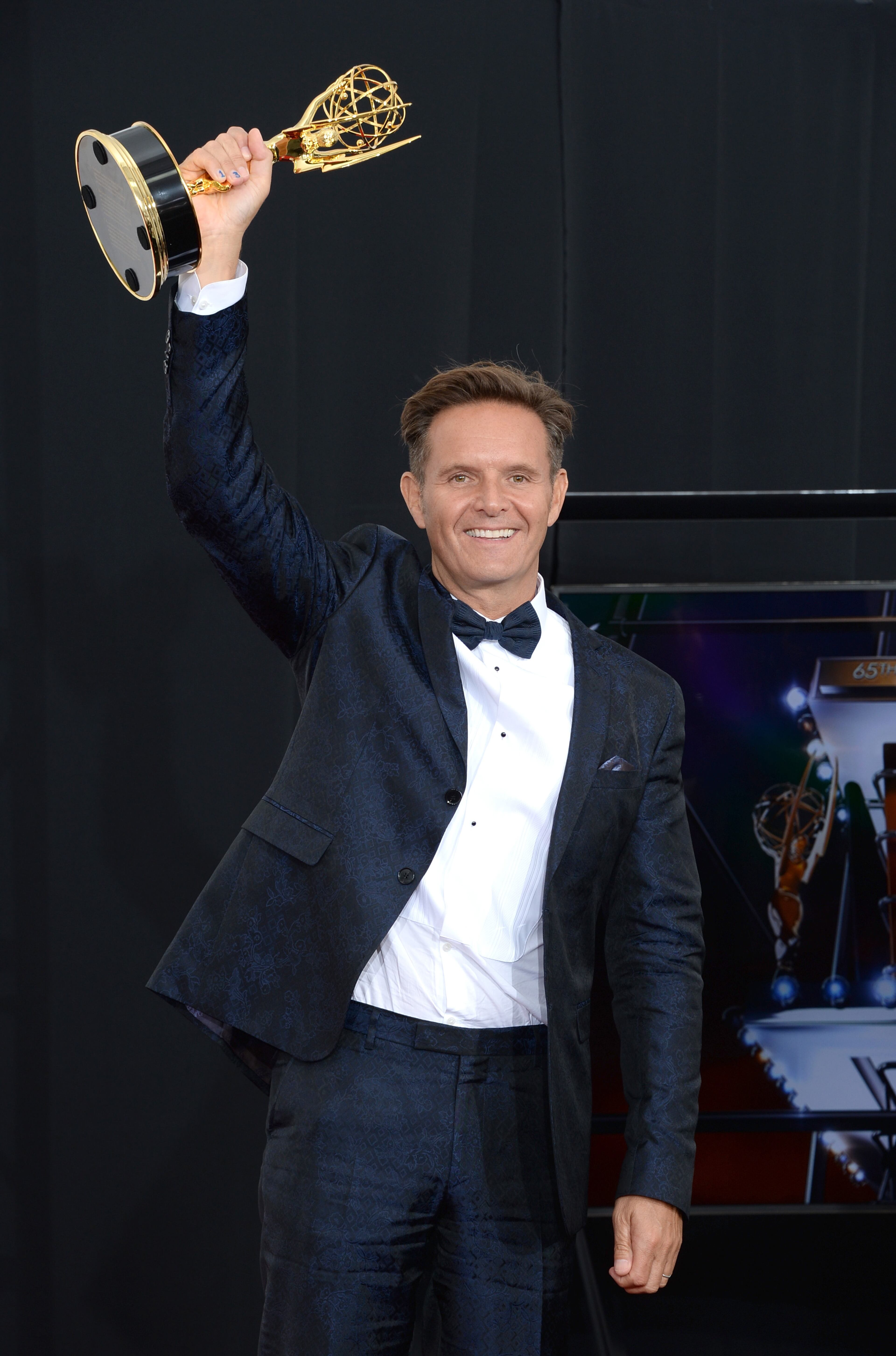 LOS ANGELES, CA - SEPTEMBER 22: Executive Producer Mark Burnett, winner of the Outstanding Reality - Competition Program Award for "The Voice" poses in the press room during the 65th Annual Primetime Emmy Awards held at Nokia Theatre L.A. Live on September 22, 2013 in Los Angeles, California. (Photo by Jason Merritt/Getty Images)