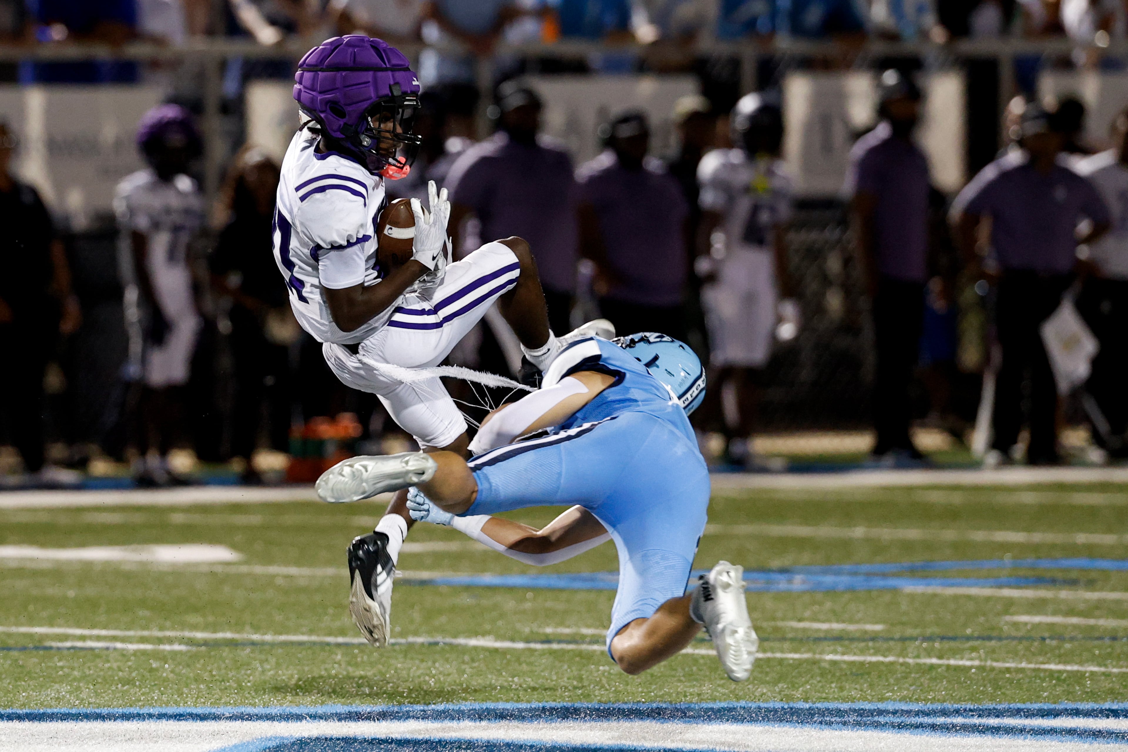 KIPP Atlanta’s Jaire Stridiron (left) makes a pass reception against North Cobb Christian’s Bryson Vickery on Friday, Oct. 2, 2026, in Kennesaw. (Erik S. Lesser for the AJC)