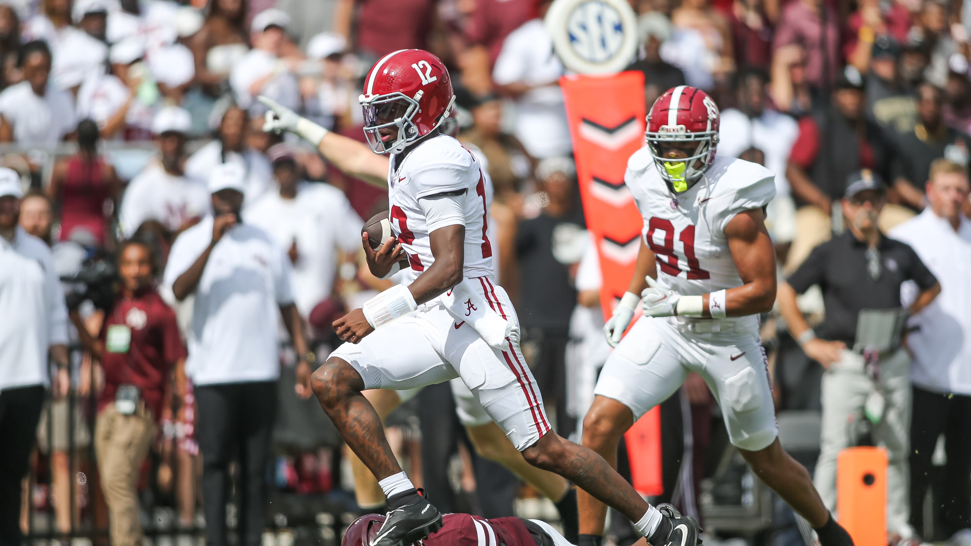 Alabama quarterback Keelon Russell (12) runs for a touchdown against Mississippi State during the first half of an NCAA college football game in Starkville, Miss., Saturday, Oct. 3, 2026. (AP Photo/James Pugh)