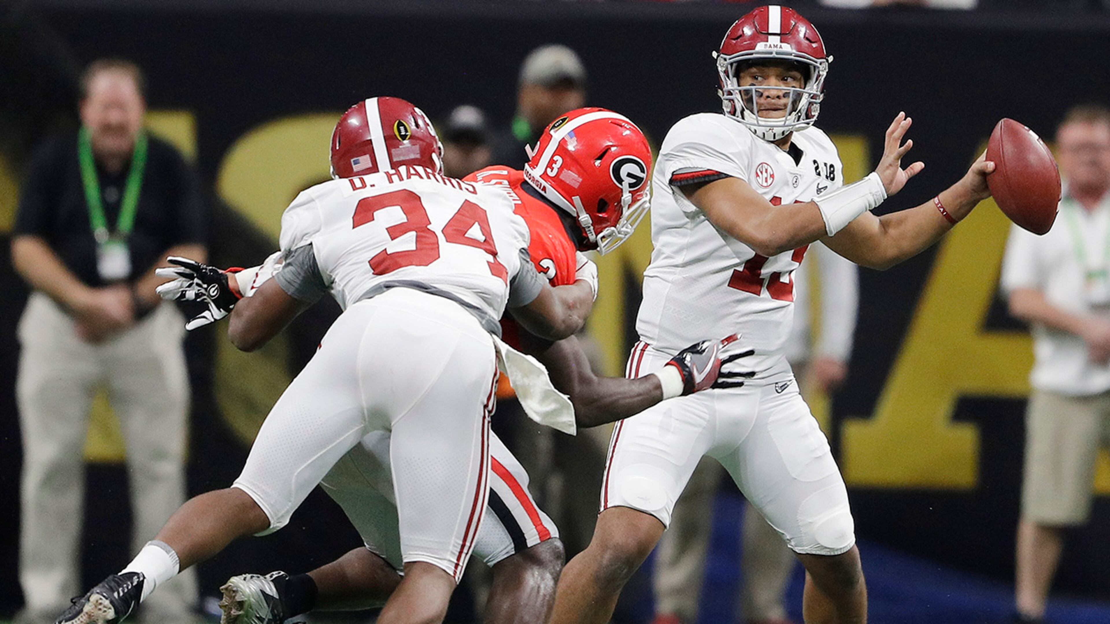 Alabama quarterback Tua Tagovailoa drops back to pass during the second half of the NCAA college football playoff championship game against Georgia Monday, Jan. 8, 2018, in Atlanta. (AP Photo/David J. Phillip)