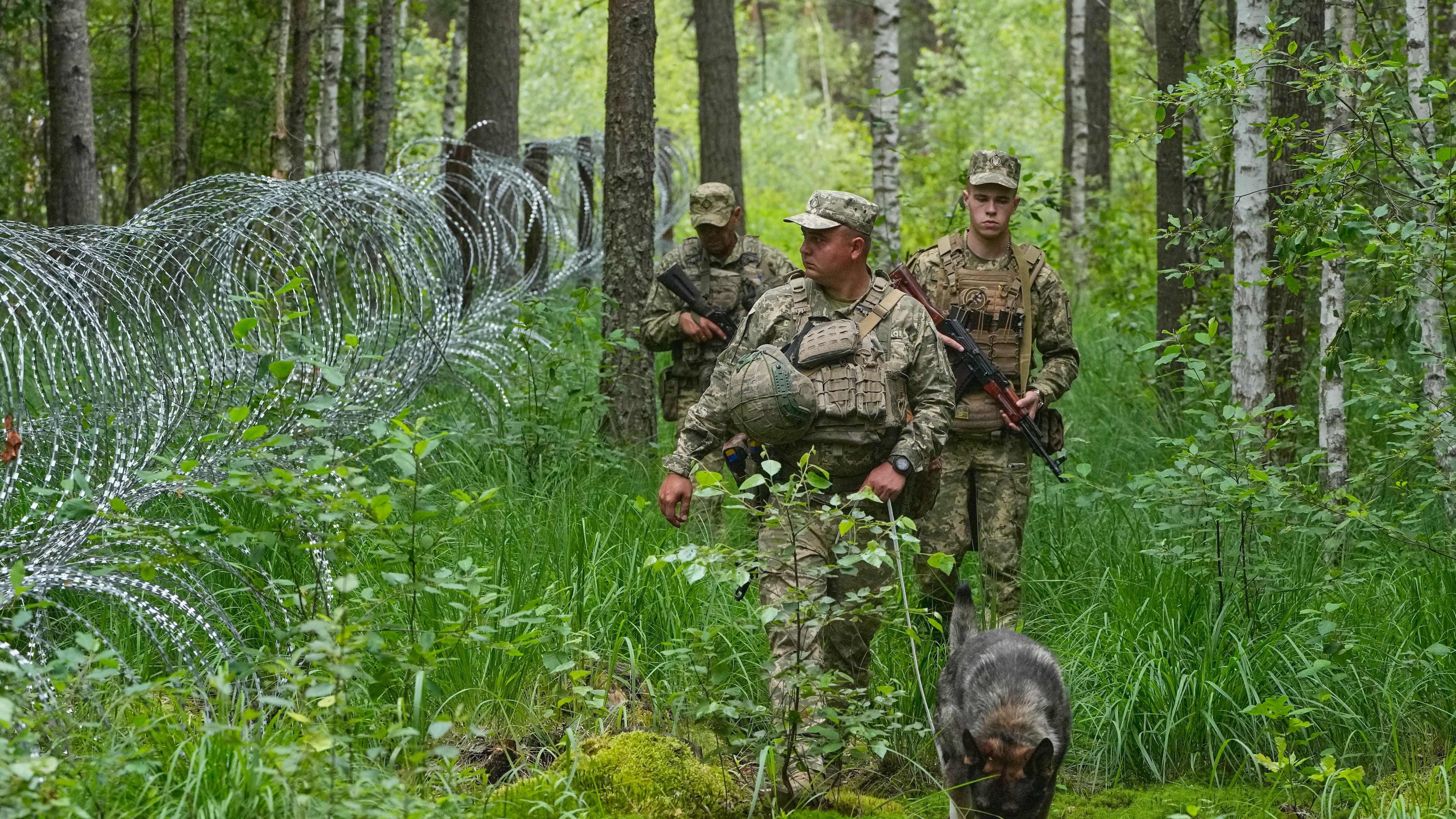Ukrainian border guards patrol Ukraine-Belarus border in an undisclosed location in Ukraine Tuesday, July 7, 2026. (AP Photo/Efrem Lukatsky)
