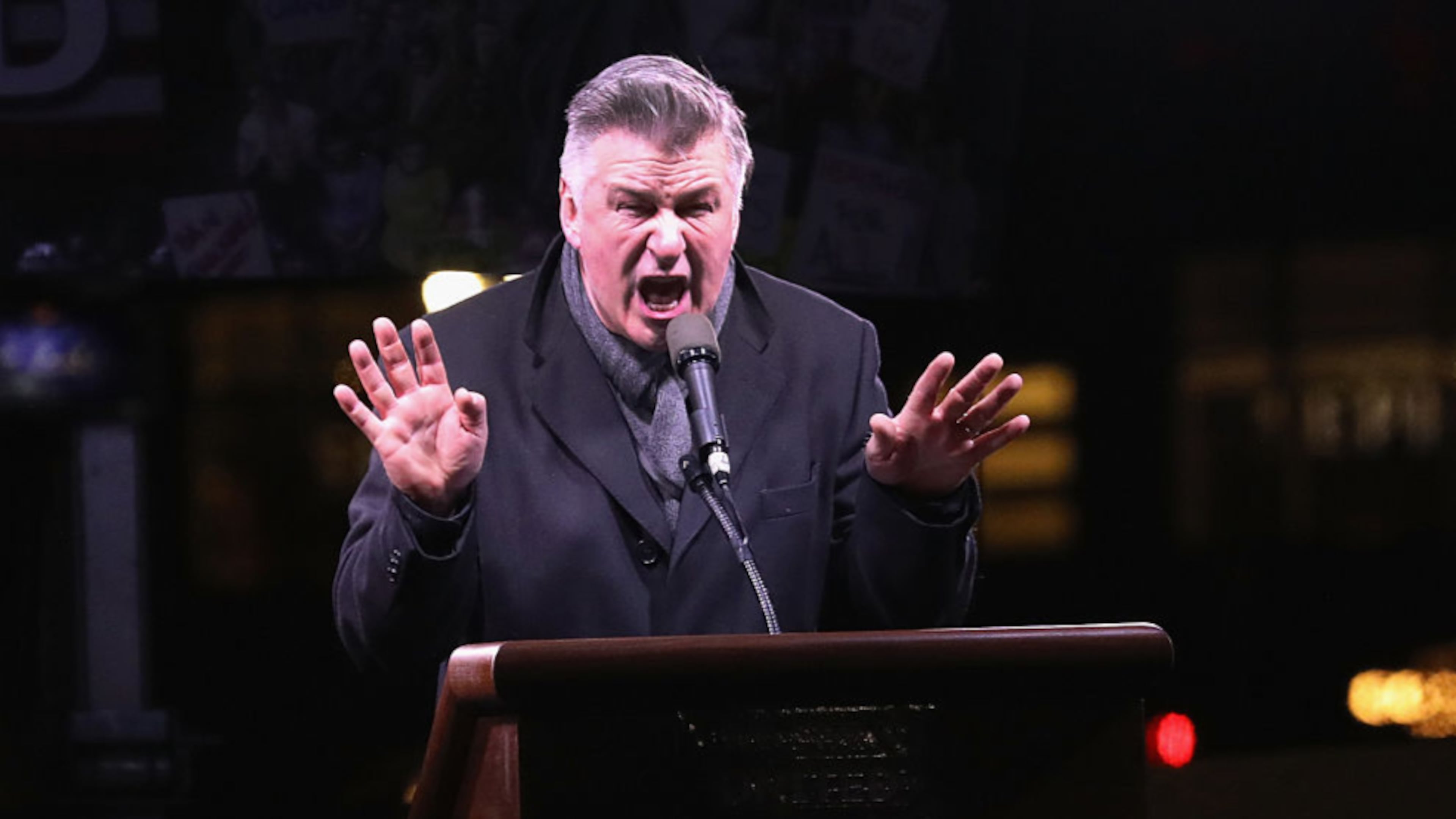 NEW YORK, NY - JANUARY 19: Actor Alec Baldwin impersonates Donald Trump during a "We Stand United" anti-Trump rally on January 19, 2017 in New York City. Thousands of people gathered outside the Trump International Hotel in Manhattan to protest on the eve of Donald Trump's inauguration as the 45th President of the United States. Baldwin regularly impersonates Trump on "Saturday Night Live.". (Photo by John Moore/Getty Images)