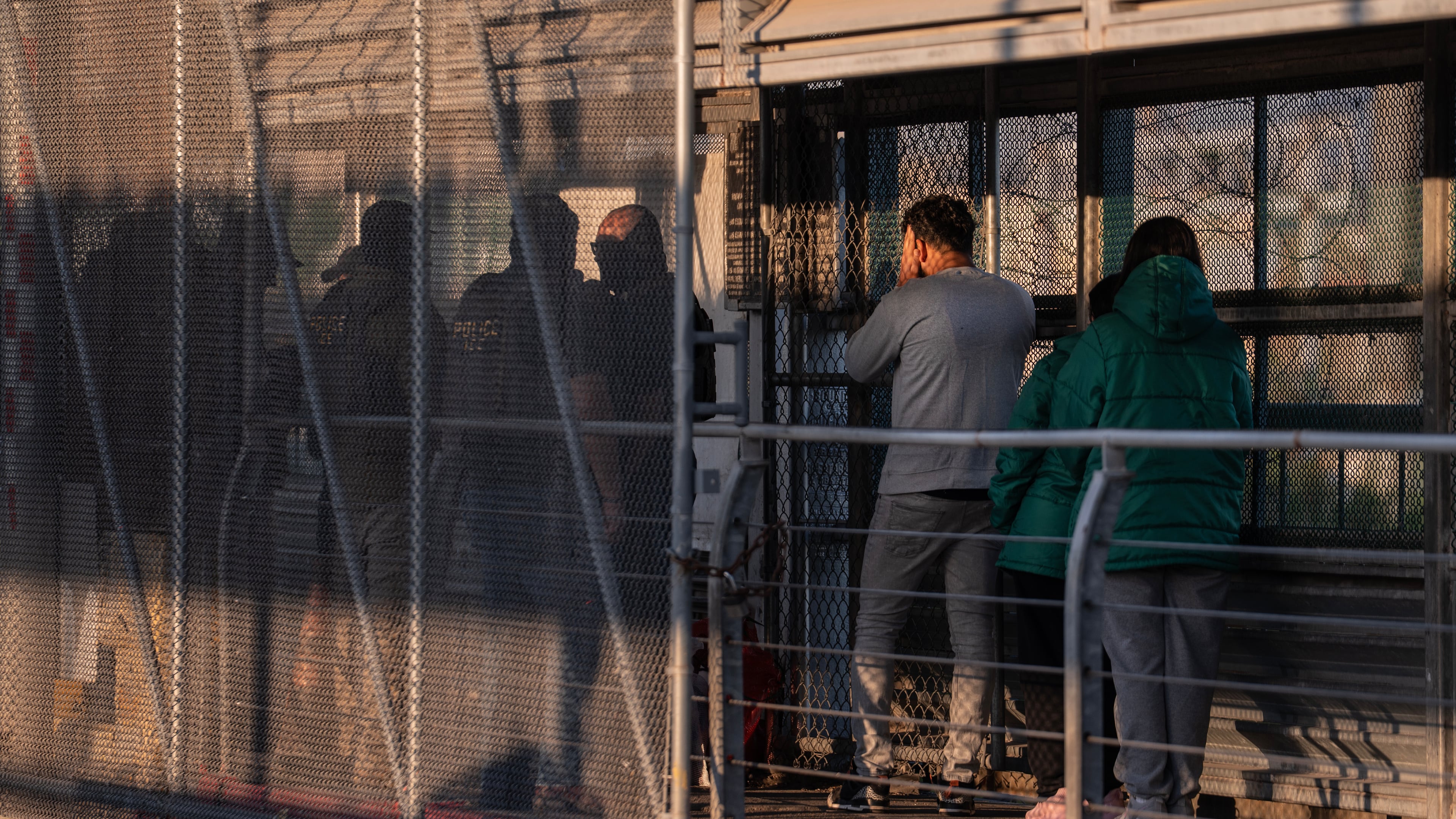 FILE - A group of undocumented migrants is deported by U.S. Immigration and Customs Enforcement agents across the McAllen–Hidalgo–Reynosa International Bridge in McAllen, Texas, March 13, 2026. (AP Photo/Felix Marquez, File)