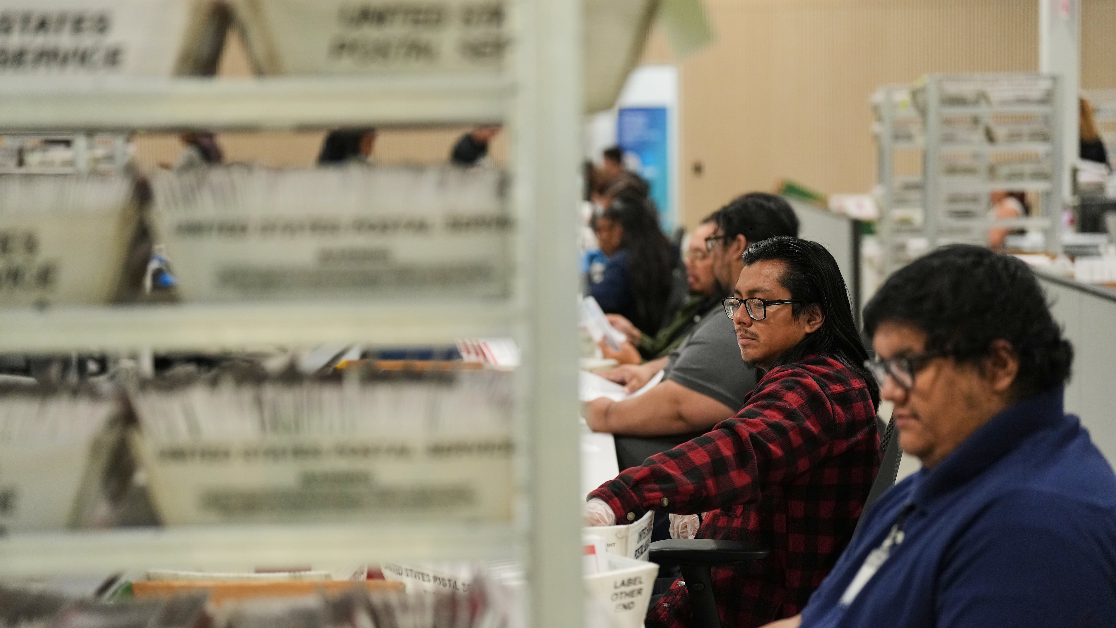 FILE - Ballots are sorted the day after California's primary election at the LA County Ballot Processing Center, June 3, 2026, in City of Industry, Calif. (AP Photo/Jae C. Hong, File)