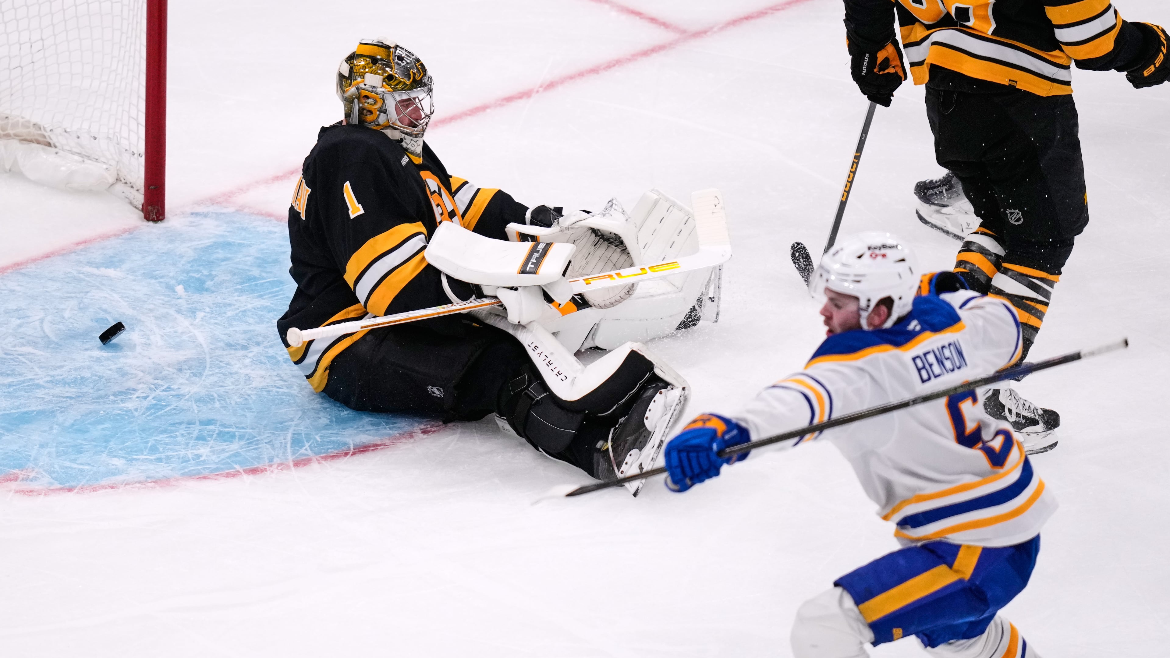 Boston Bruins goaltender Jeremy Swayman (1) sits on the ice after giving up a goal to Buffalo Sabres left wing Zach Benson (6) during the third period in Game 6 of a first-round NHL hockey Stanley Cup playoff series, Friday, May 1, 2026, in Boston. (AP Photo/Charles Krupa)