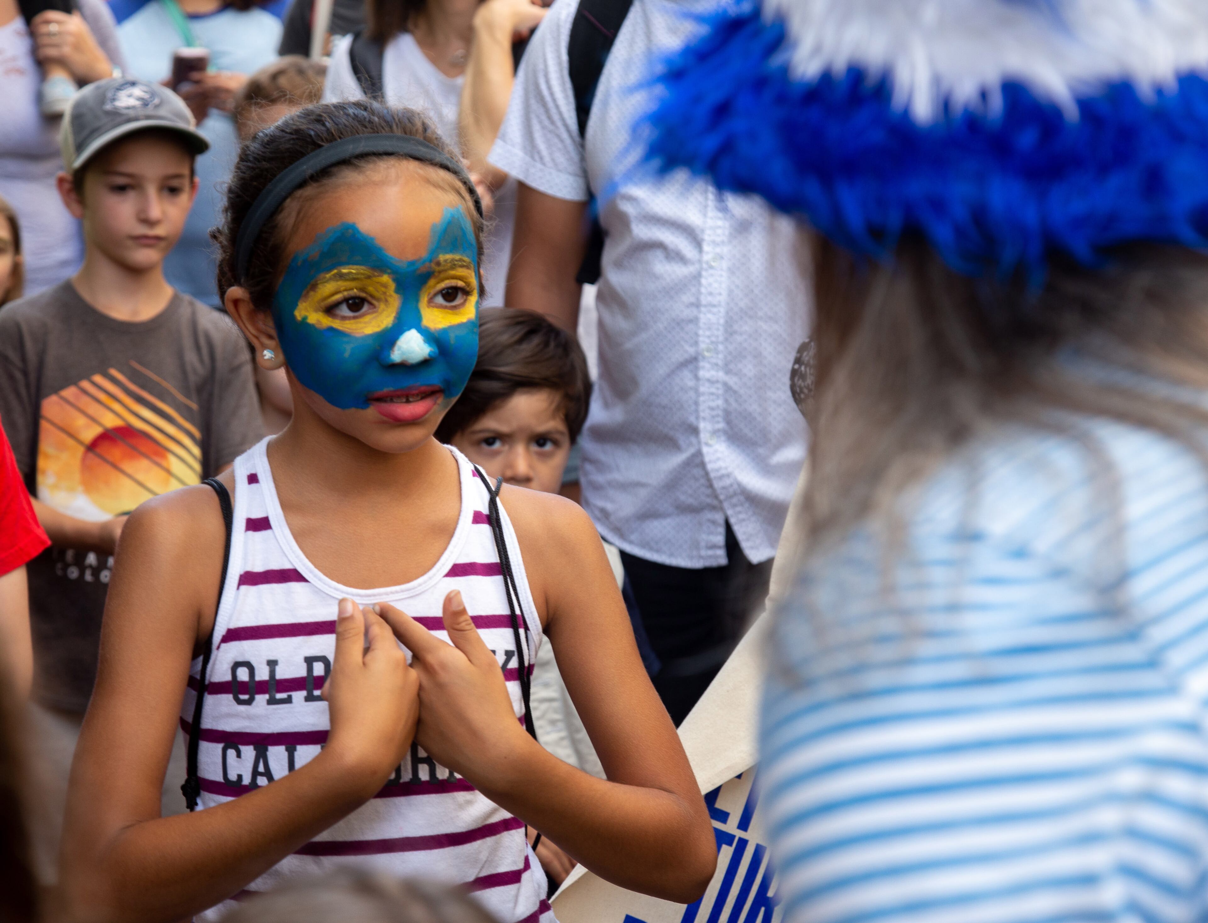 Mathilda Lafond, 8, talks with Author James Dean before the start of the Children's Parade during the AJC Decatur Book Festival on Sunday, September 1, 2019. STEVE SCHAEFER / SPECIAL TO THE AJC