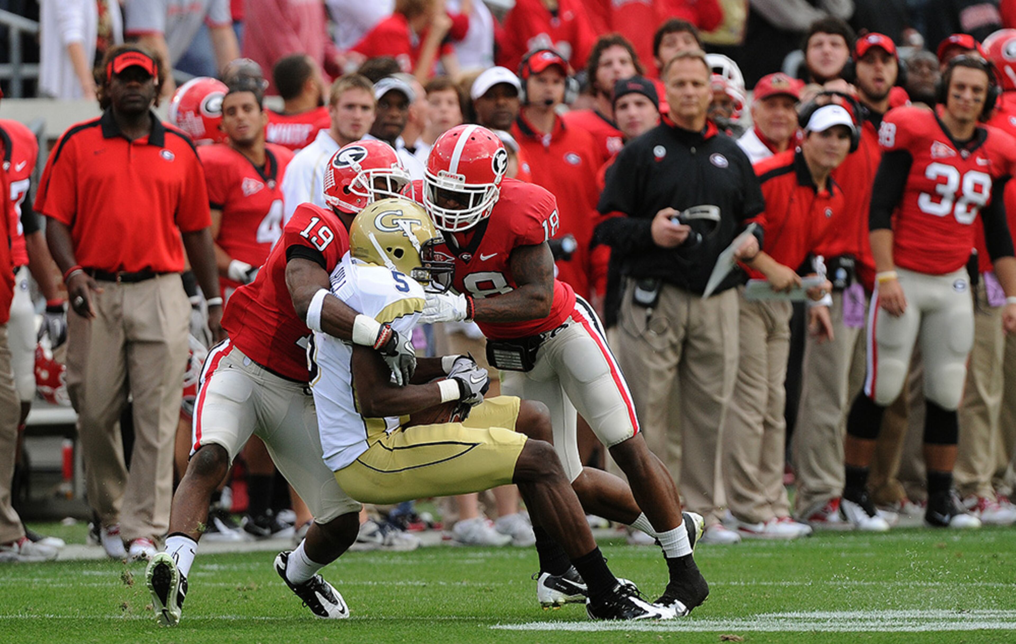 (13) Georgia 31, (23) Georgia Tech 17, Nov. 26, 2011 - Georgia's Aaron Murray threw four touchdown passes. Tech's Tevin Washington threw a pair of interceptions. Tech rushed for 243 yards out of the triple-option against the nation's second-ranked run defense, but just 79 came after halftime. The result: (13) Georgia 31, (23) Georgia Tech 17.