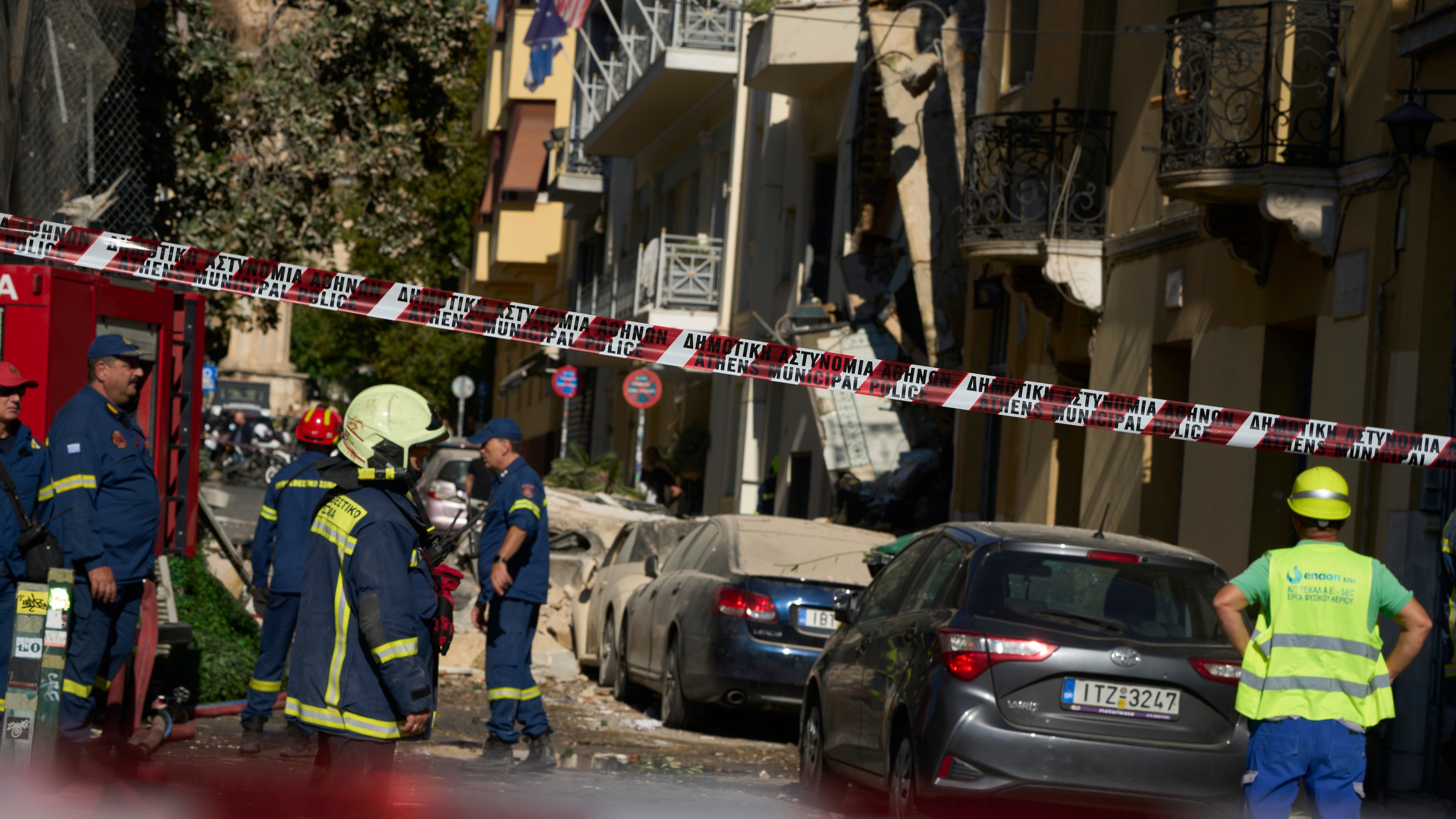 Firefighters work at the scene following a powerful blast that caused a building to collapse and injured at least two people in Athens' Plaka district, Friday, Sept. 25, 2026. (AP Photo/Petros Giannakouris)