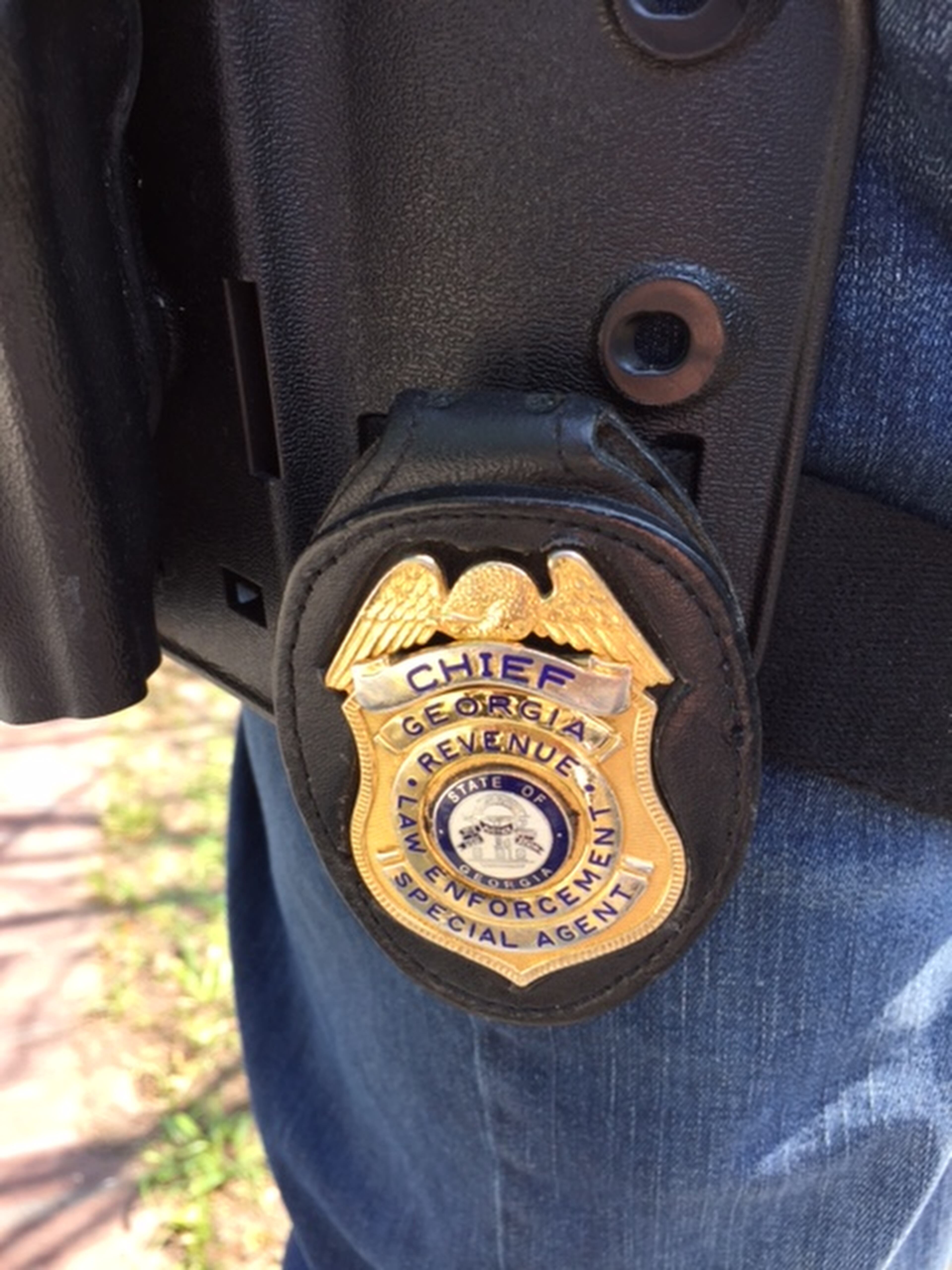 Georgia Department of Revenue investigators execute a search warrant at B & B Accounting and Tax Services offices in Hapeville on May 6, 2016. Agents are investigating the business run by Ruth Barr, a city council member in Hapeville. Read the story here: http://www.myajc.com/news/news/crime-law/hapeville-official-leaves-trail-of-fraud-allegatio/nrLFb/