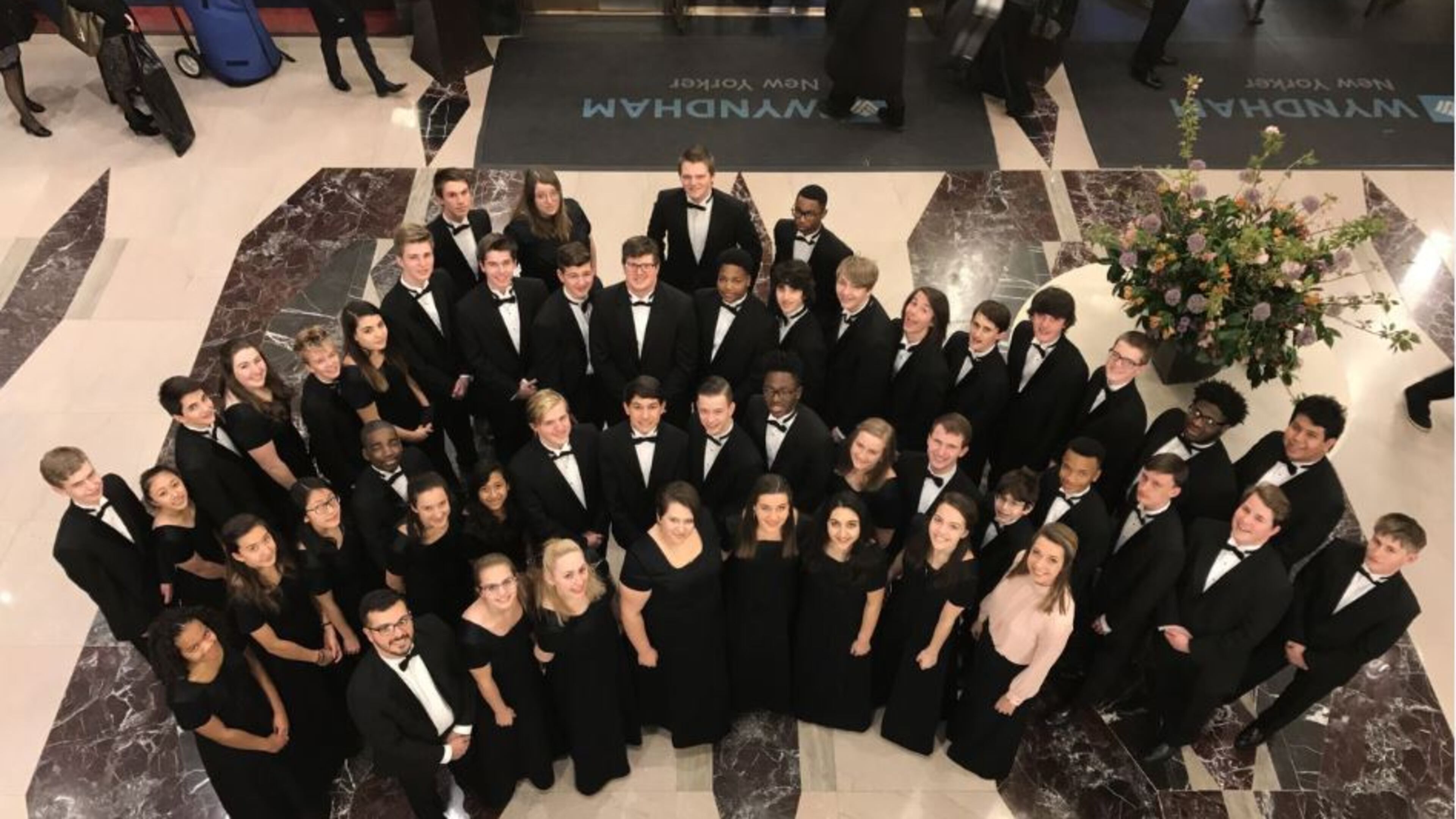 This photo shows the entire group in the lobby of the Wyndham New Yorker Hotel, before their performance in Carnegie Hall.