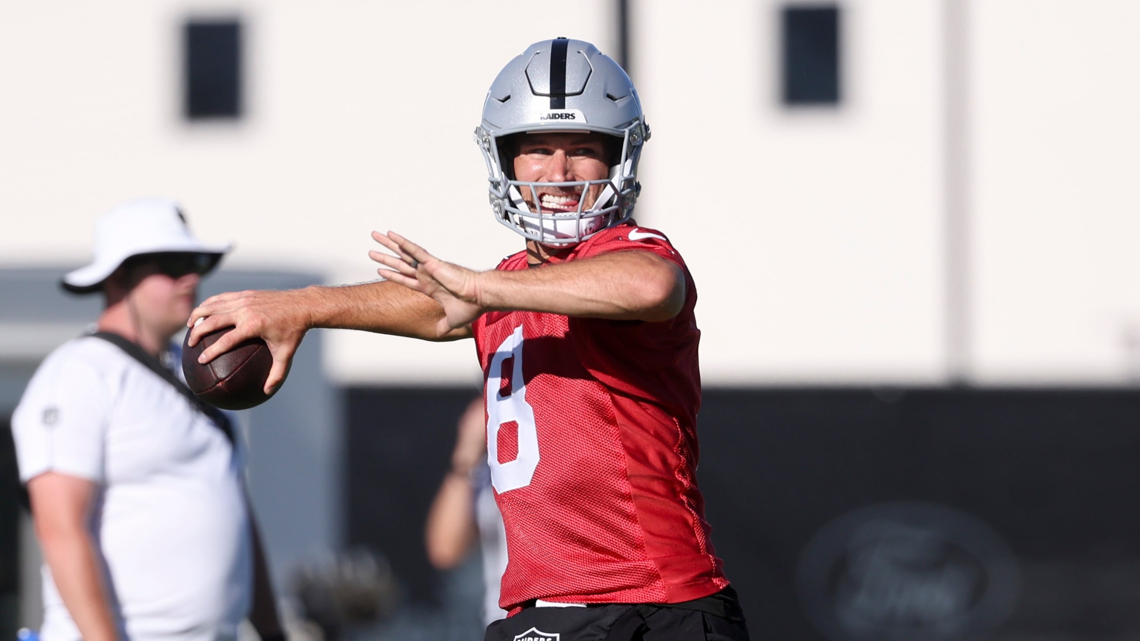 Las Vegas Raiders quarterback Kirk Cousins (8) throws a pass during practice at the team's NFL football training camp, Thursday, July 30, 2026, in Henderson, Nev. (AP Photo/Ian Maule)
