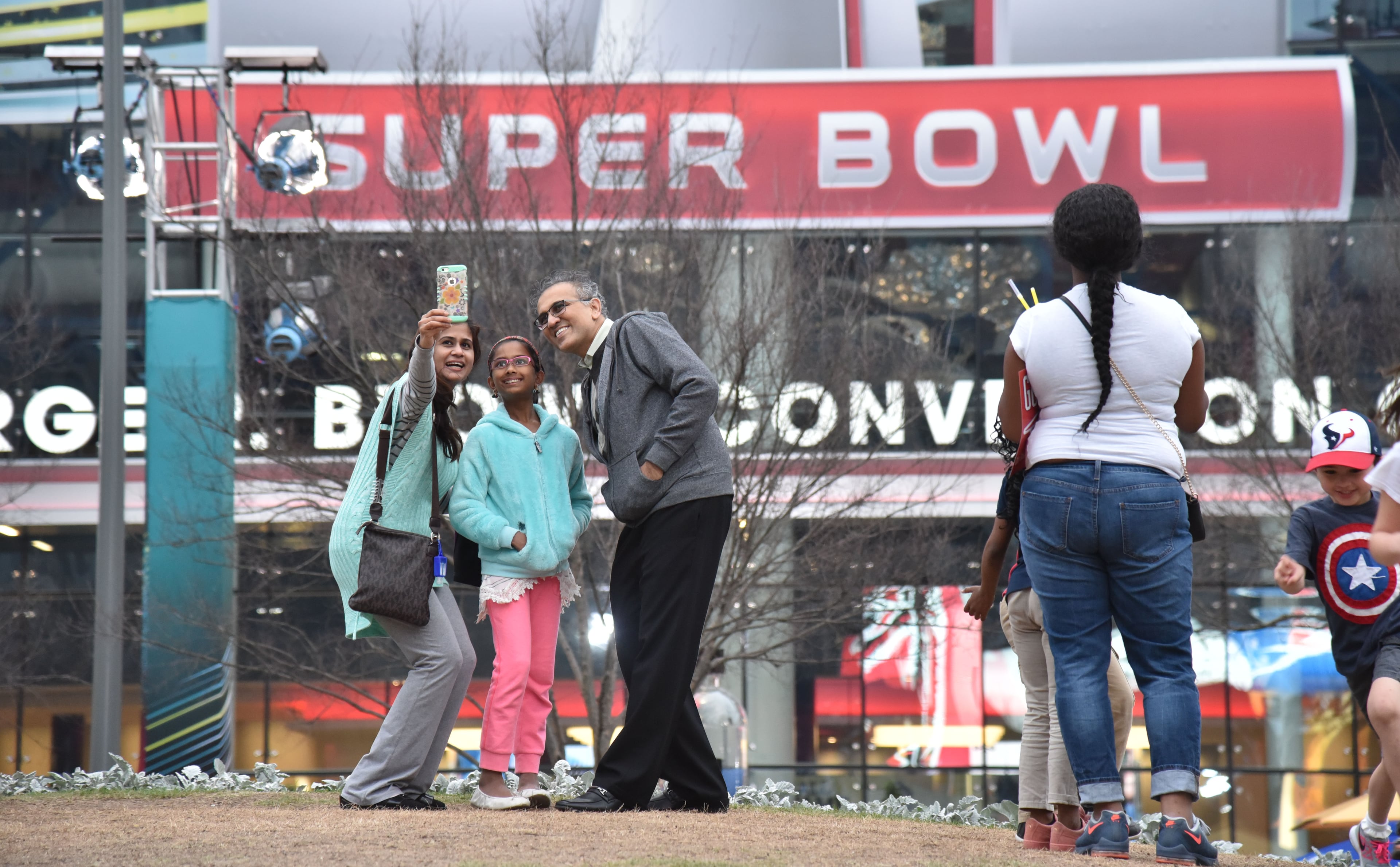 February 2, 2017 Houston, TX - Visitors enjoy a variety of displays and entertainment attractions outside the George R. Brown Convention Center in Houston, TX, on Thursday, February 2, 2017. HYOSUB SHIN / HSHIN@AJC.COM