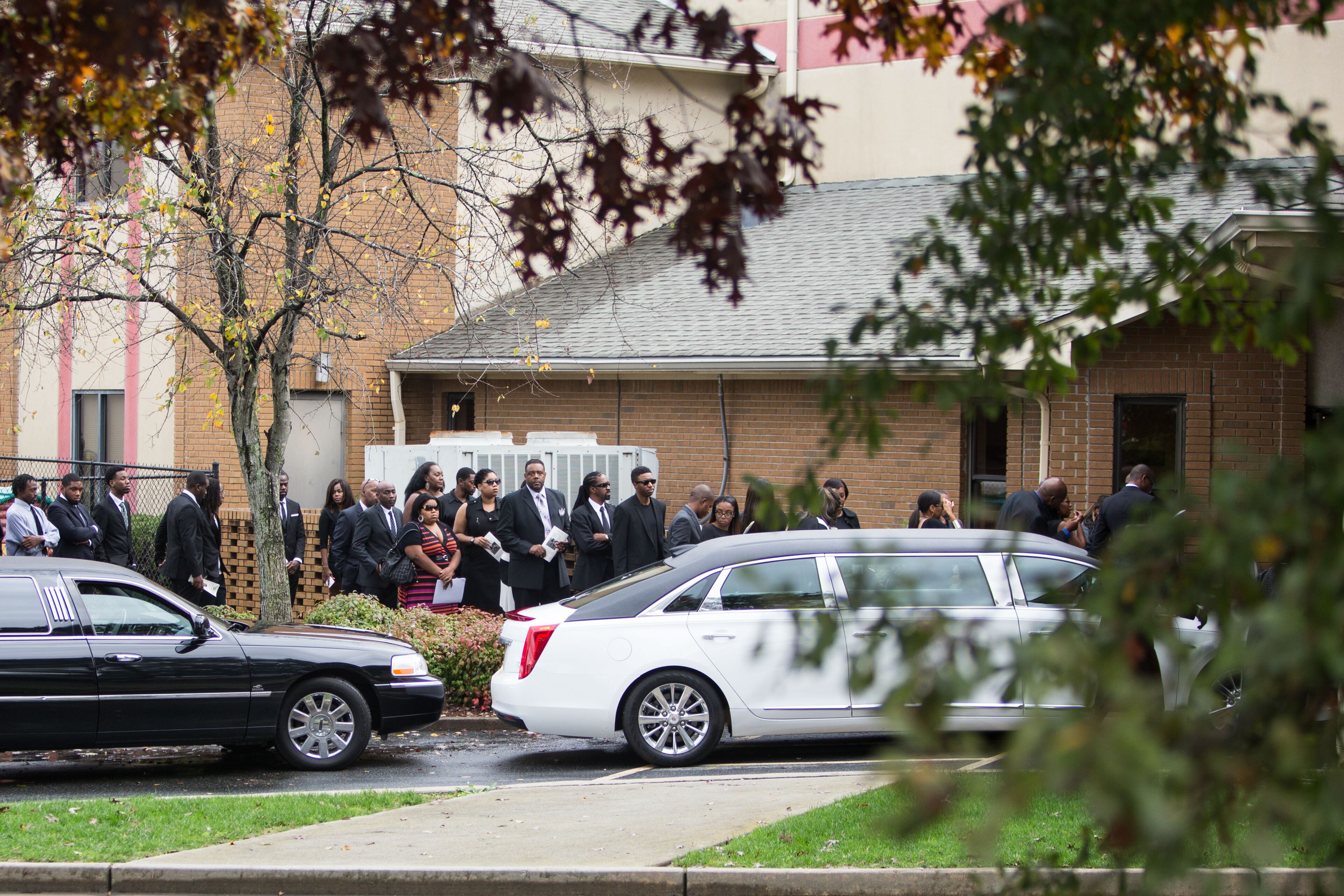 Mourners wait to enter Lawrenceville Church of God for the funeral of 17-year-old Jared Brown and his 15-year-old brother Jaison Brown who were killed in a car accident last week, Saturday, Nov. 7, 2015, in Lawrenceville, Ga. BRANDEN CAMP/SPECIAL