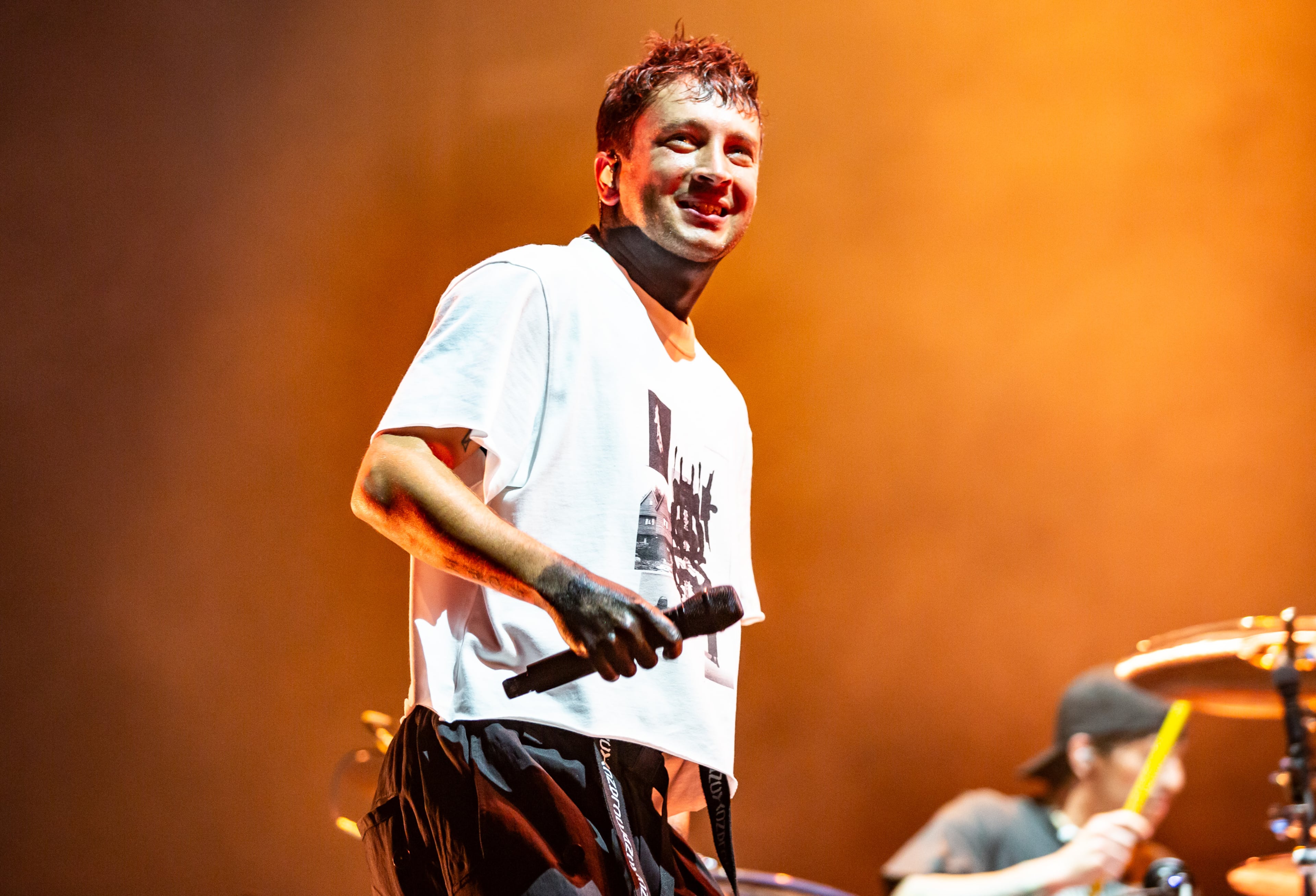 After a lengthy rain delay and evacuation, Twenty One Pilots closed out Saturday night at Shaky Knees with genre bending hits on the Peachtree Stage on Sept. 19, 2026, in Atlanta. (Ryan Fleisher for the AJC)