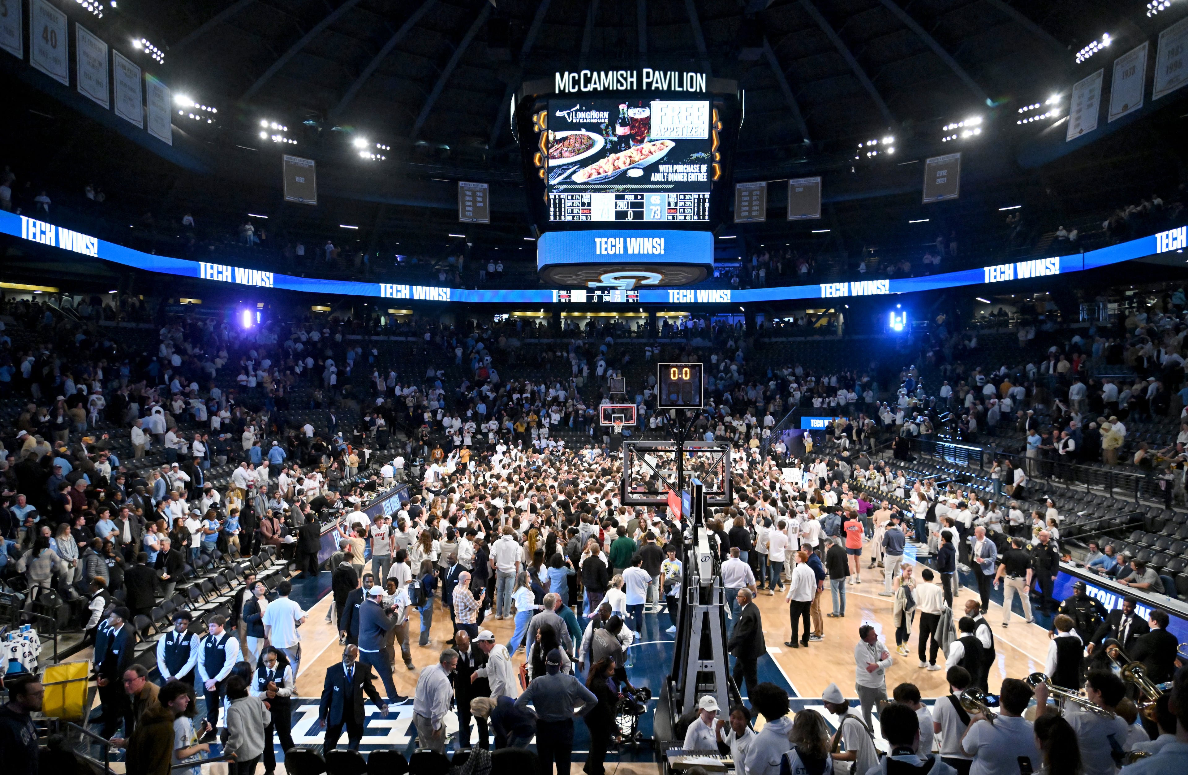Fans storm the court as Georgia Tech celebrates the victory over North Carolina in an NCAA college basketball game at Georgia Tech’s McCamish Pavilion, Tuesday, January 30, 2024, in Atlanta. Georgia Tech won 74-73 over North Carolina. (Hyosub Shin / Hyosub.Shin@ajc.com)
