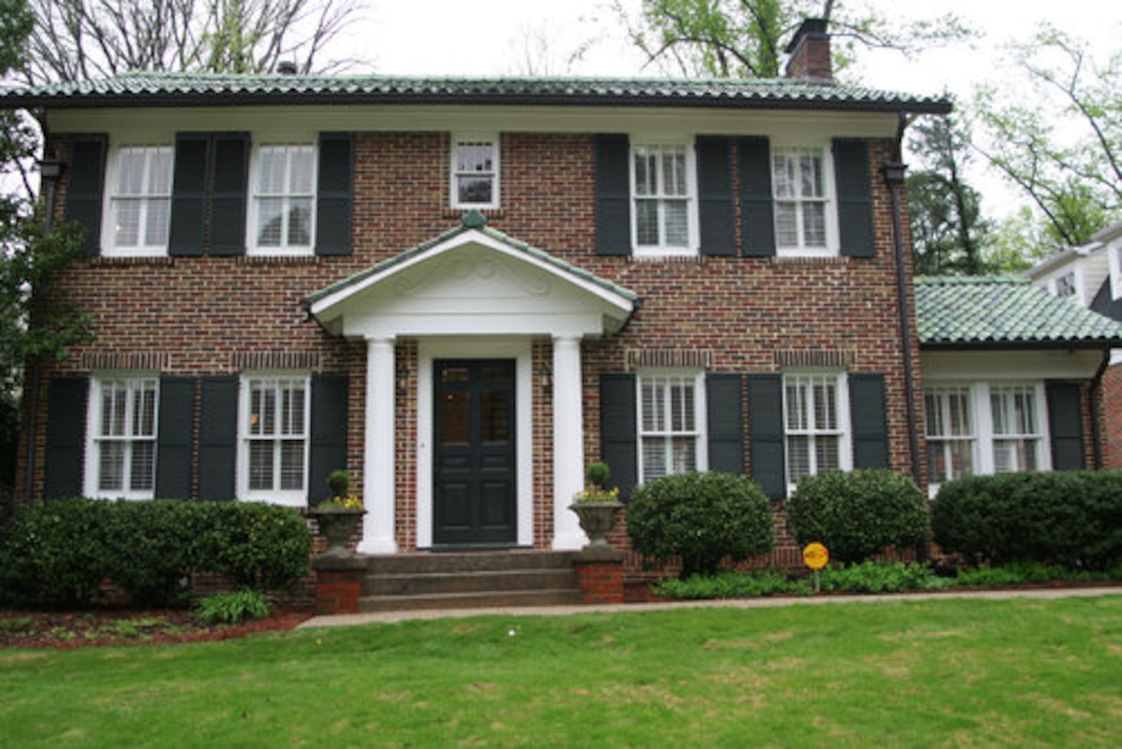 While they liked the brick home's traditional exterior, the inside has a more modern layout with the addition. They added a new kitchen and great room, master bedroom and garage-studio at the rear of the property. "We wanted to keep elements of traditional, but have it be more eclectic on the inside because that's more our style," Cannon says.