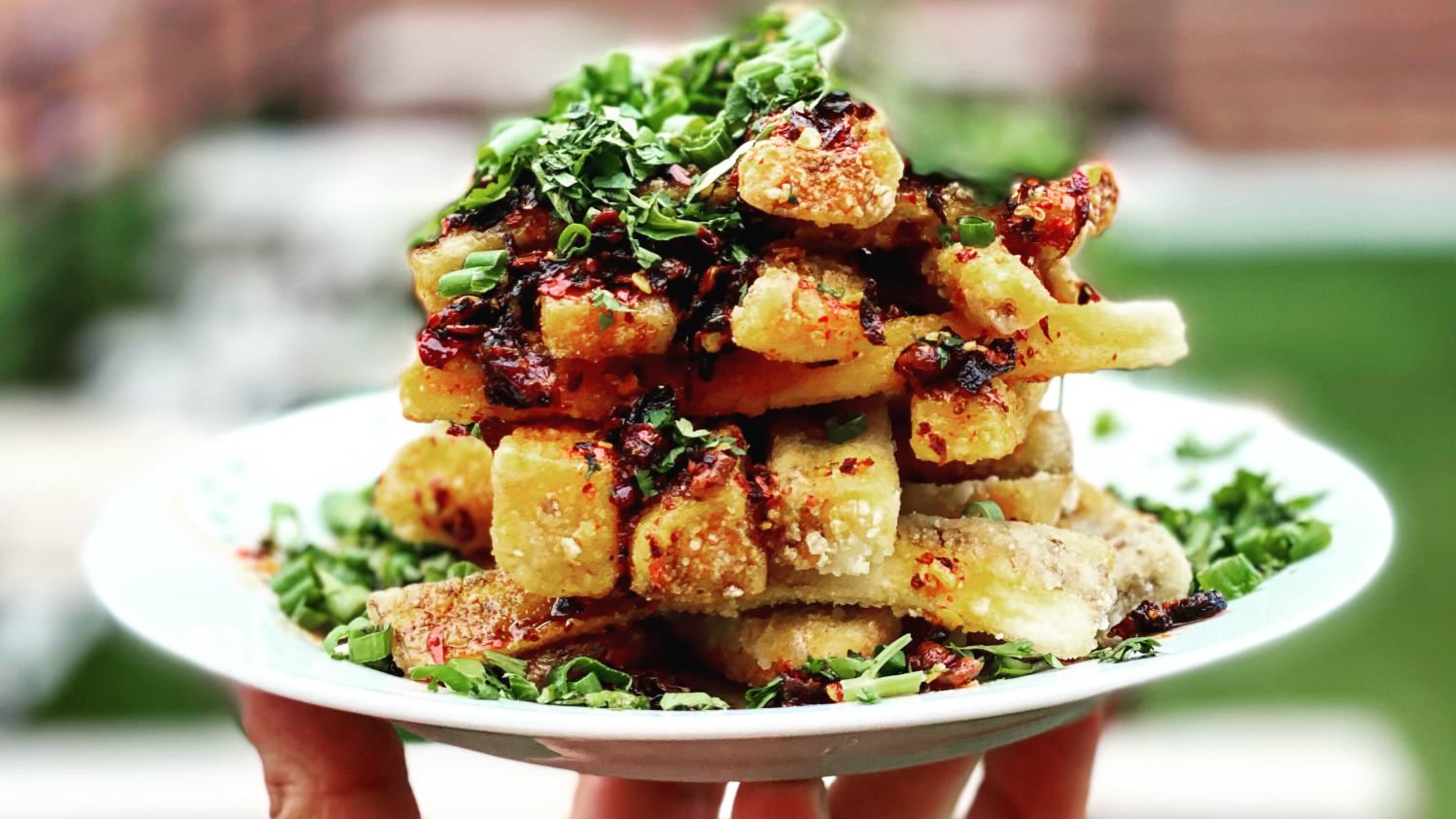 Eggplant fries, with chile crisp, scallions and cilantro, are a favorite at the Companion. Courtesy of the Companion.