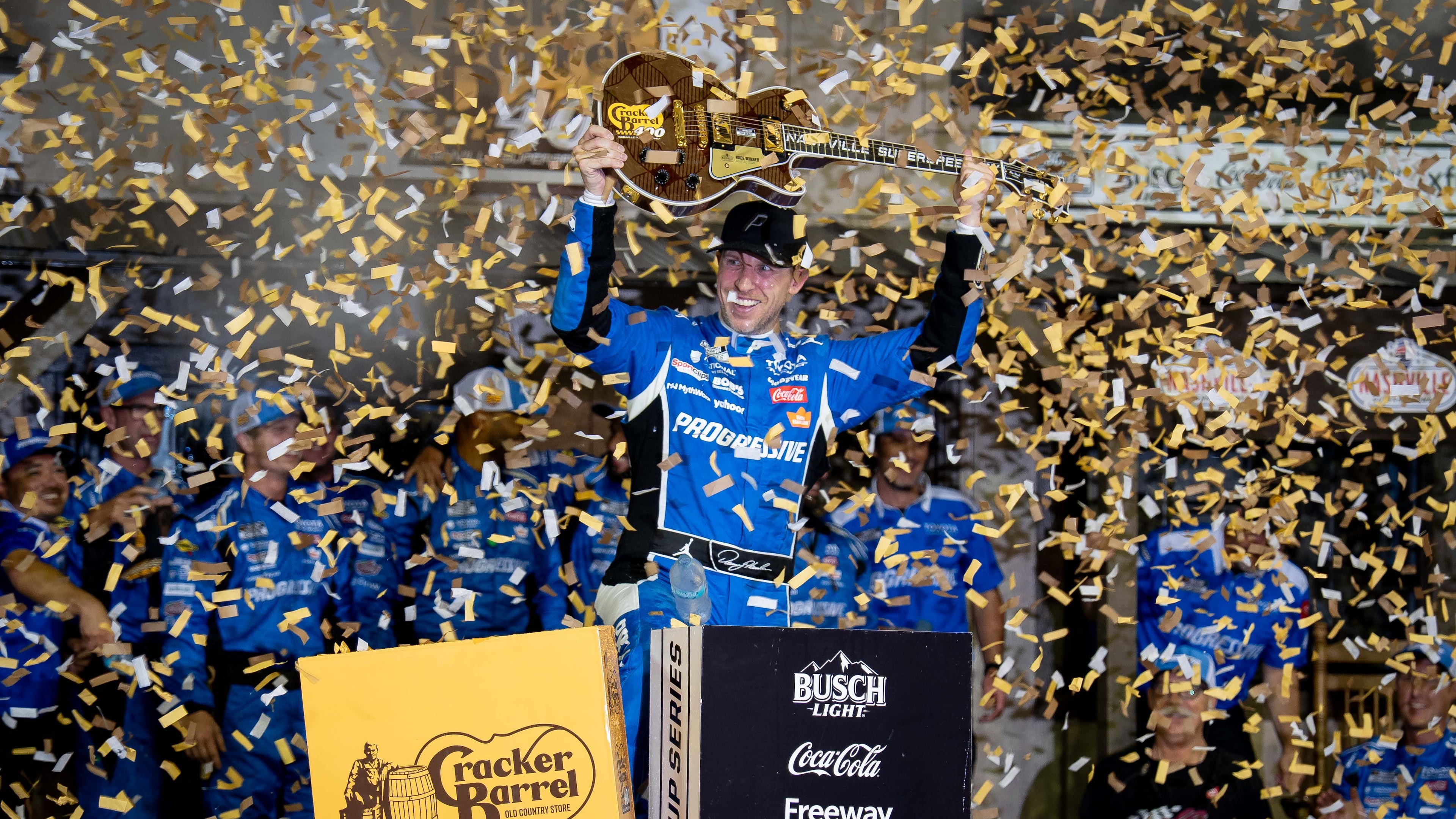 Denny Hamlin celebrates after winning a NASCAR Cup Series auto race, Sunday, May 31, 2026, in Lebanon, Tenn. (AP Photo/Camden Hall)