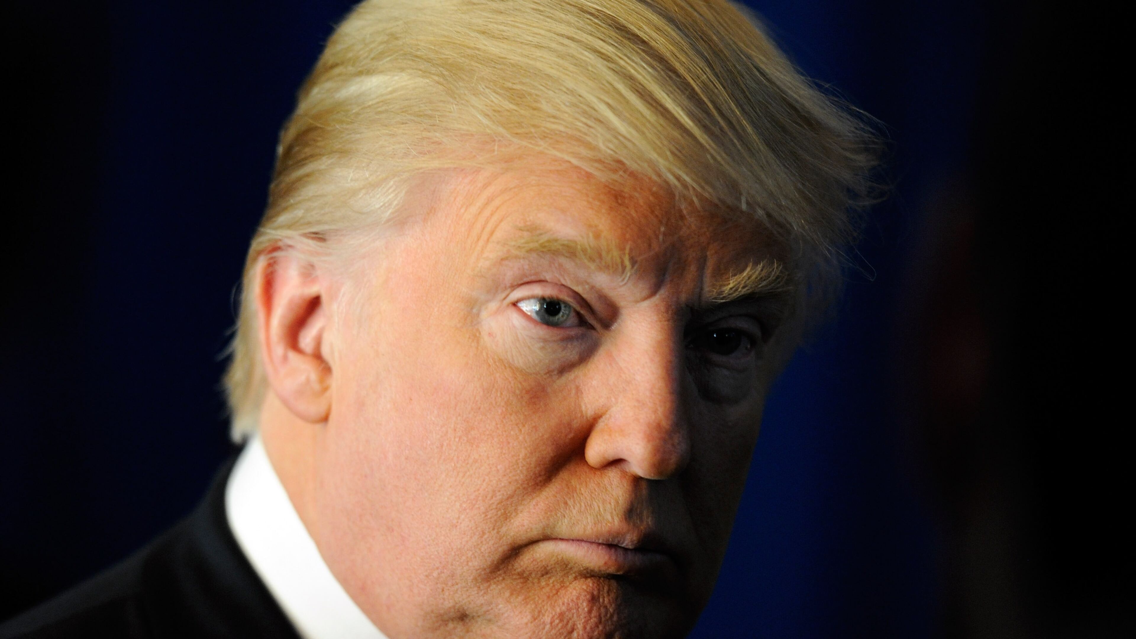 Donald Trump speaks to members of the media before endorsing Republican presidential candidate, former Massachusetts Gov. Mitt Romney at the Trump International Hotel & Tower Las Vegas February 2, 2012 in Las Vegas, Nevada. Romney came in first in the Florida primary on January 31 and is looking ahead to Nevada's caucus on February 4. (Photo by Ethan Miller/Getty Images)