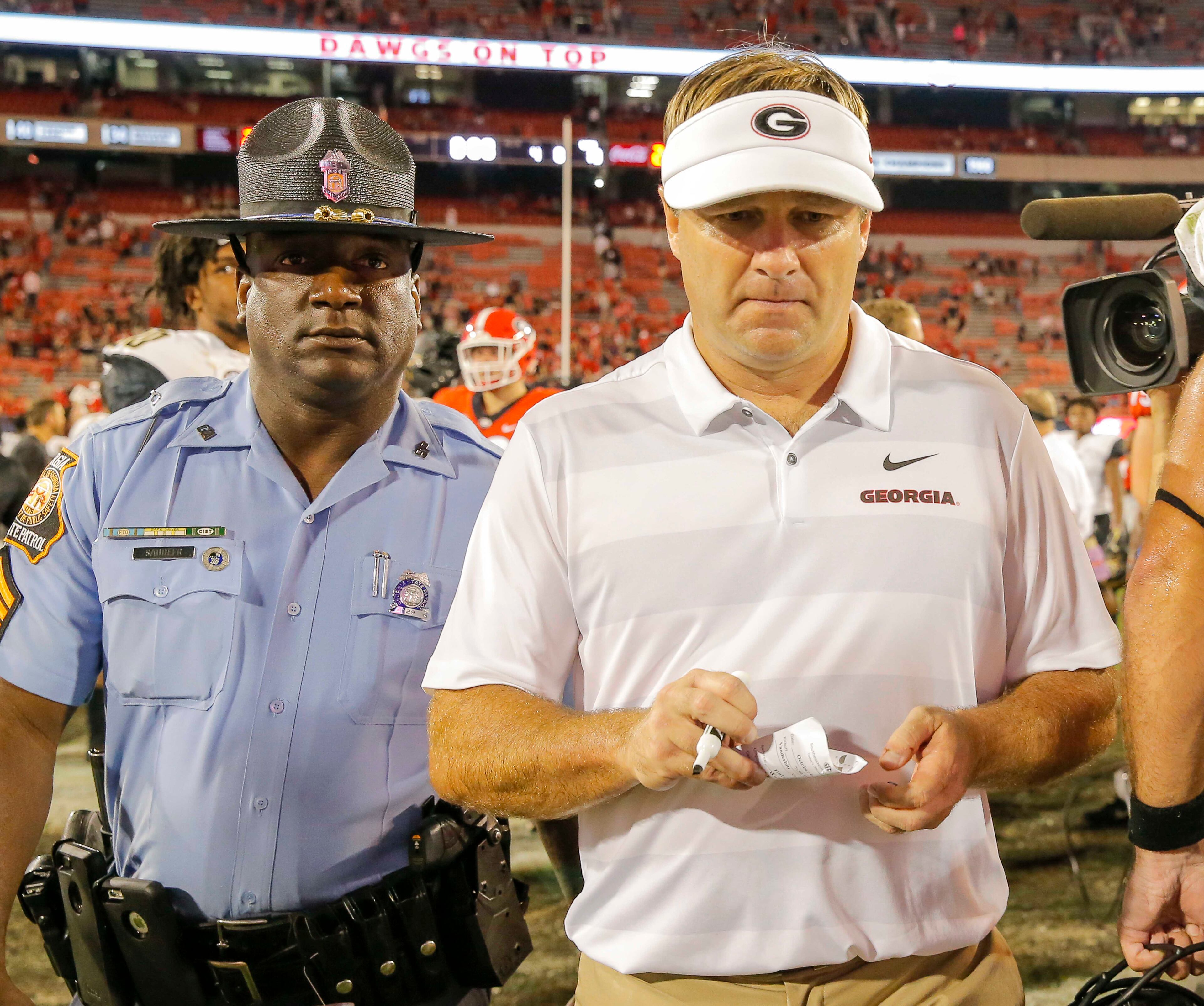 10/06/2018 -- Athens, Georgia -- Georgia head coach Kirby Smart walks off the field following the game against Vanderbilt at Sanford Stadium in Athens, Saturday, October 6, 2018. The Bulldogs beat Vanderbilt 41-13. (ALYSSA POINTER/ALYSSA.POINTER@AJC.COM)