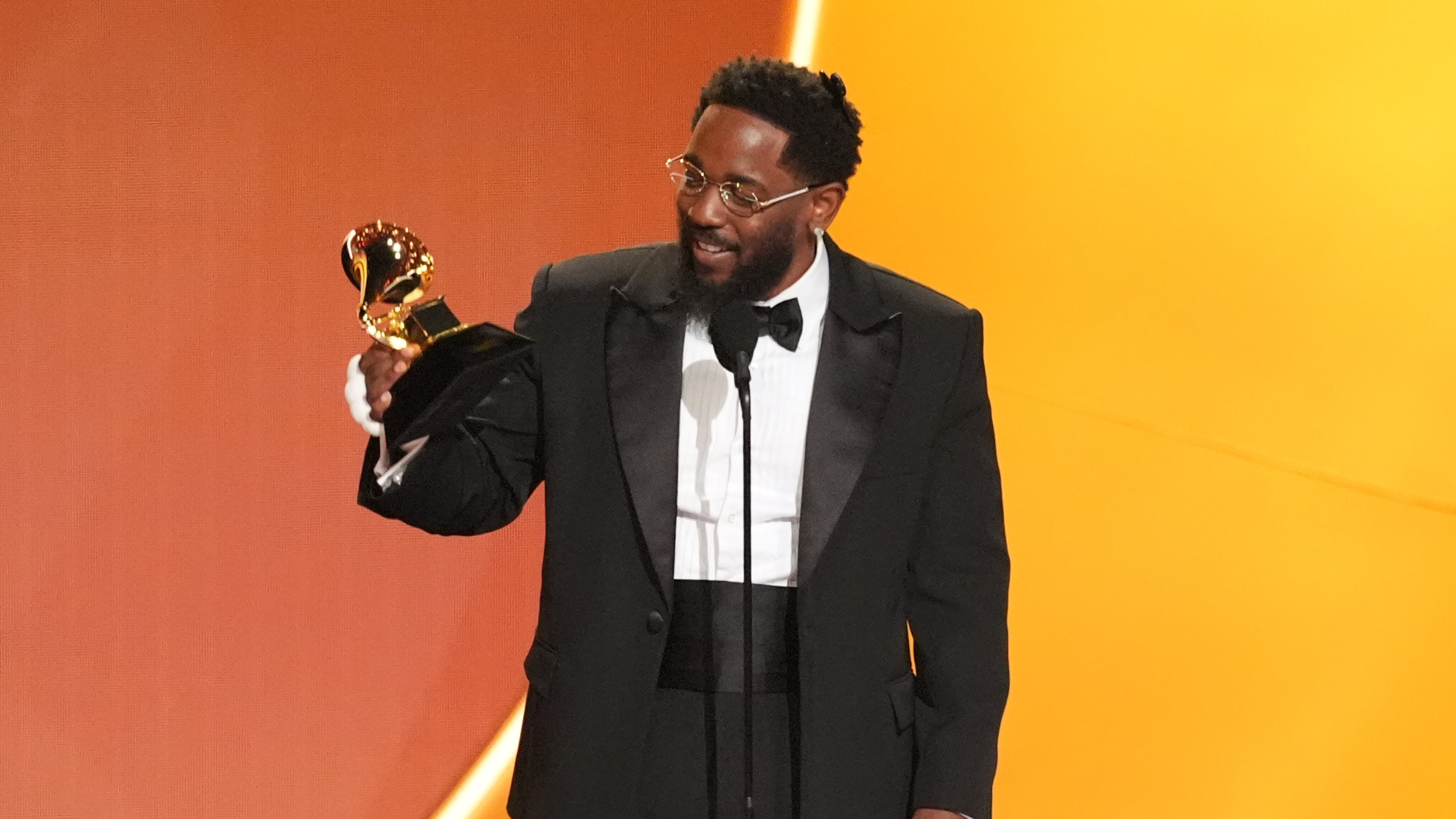 Kendrick Lamar accepts the award for best rap album for "GNX" during the 68th annual Grammy Awards on Sunday, Feb. 1, 2026, in Los Angeles. (AP Photo/Chris Pizzello)