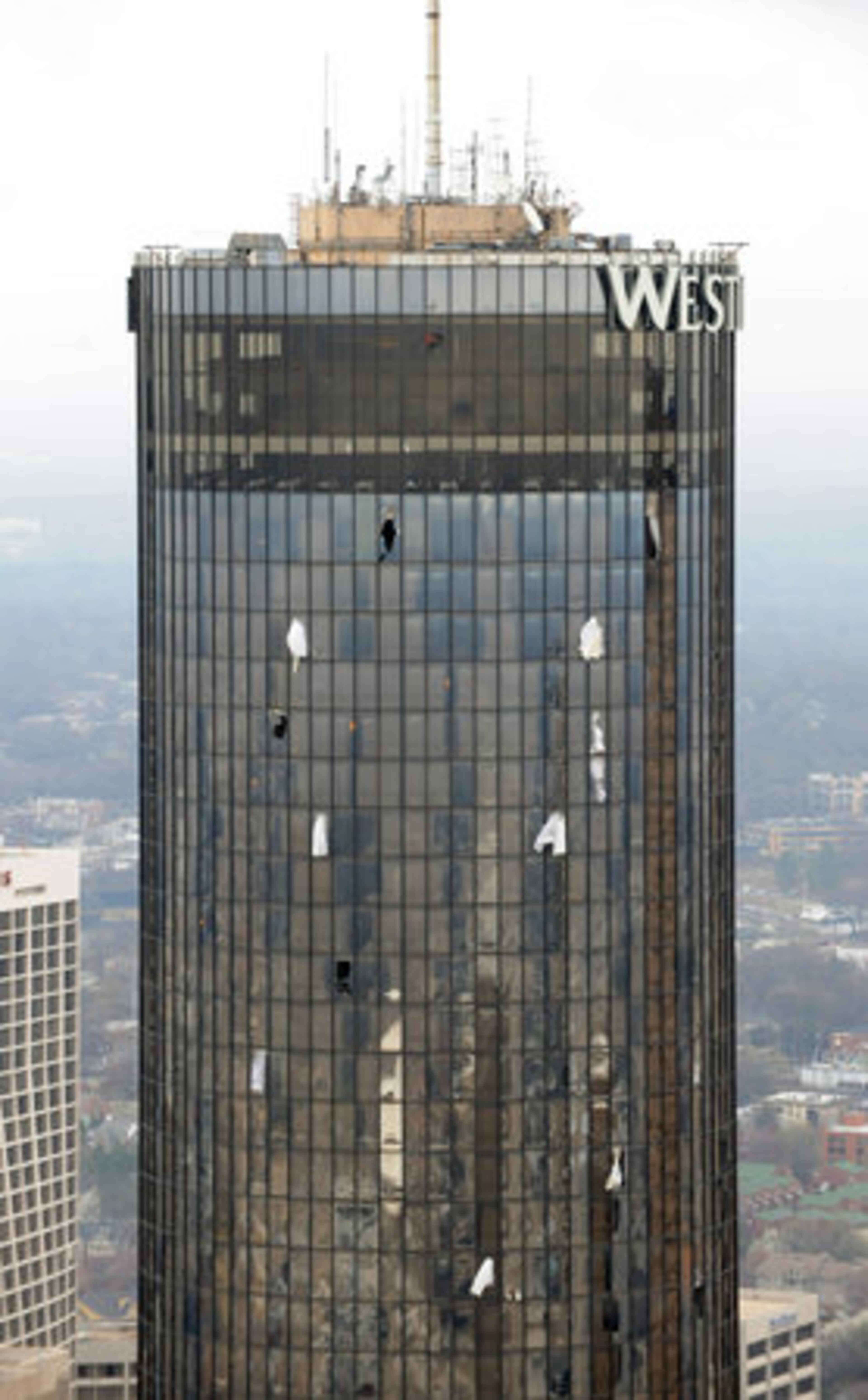 Saturday: Windows were seen blown out at the Westin Peachtree Plaza in downtown Atlanta.