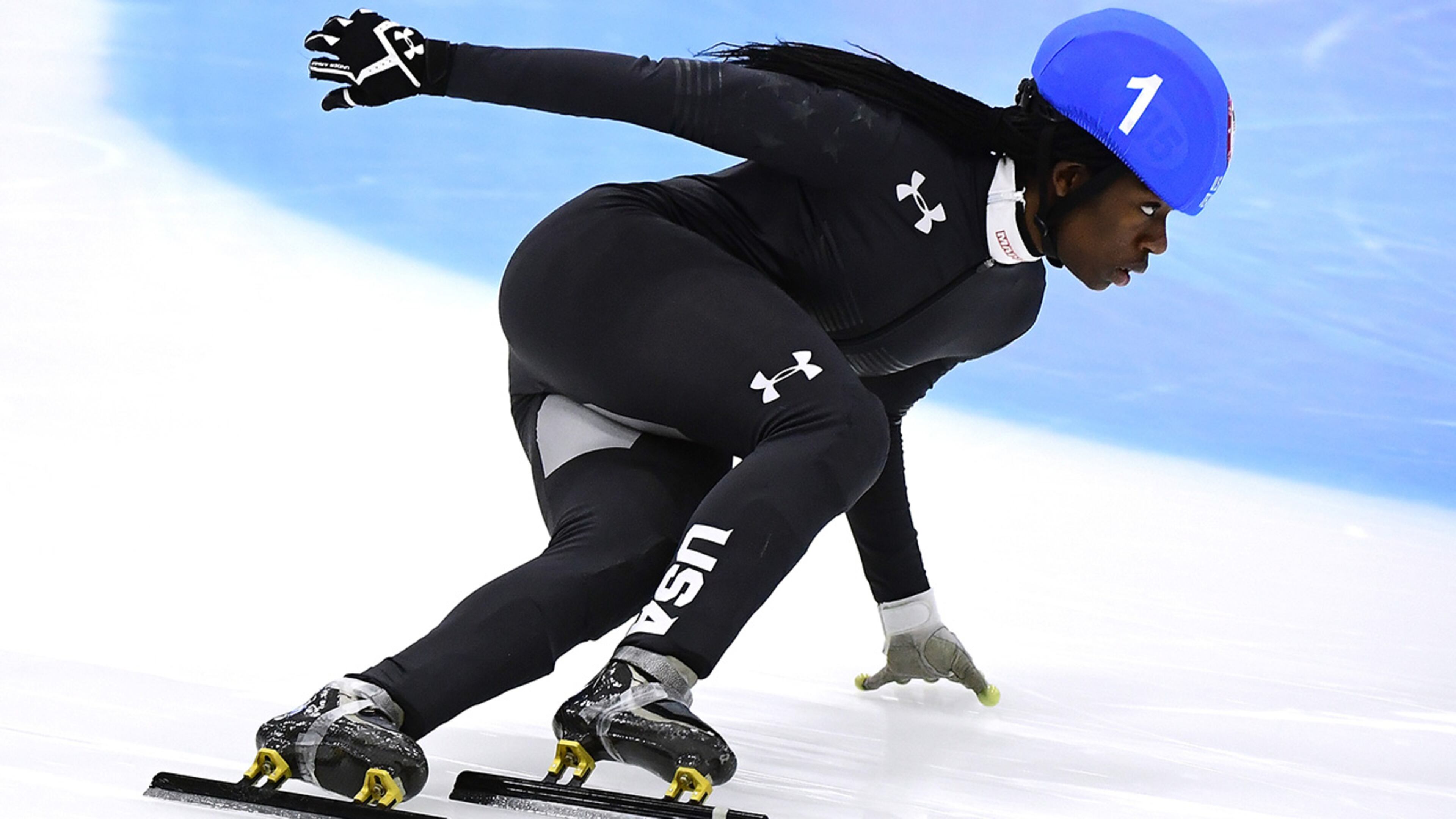 SALT LAKE CITY, UT - DECEMBER 16: Maame Biney #1 corners in the Women's 500 Meter A Final during the 2018 U.S. Speedskating Short Track Olympic Team Trials at the Utah Olympic Oval on December 16, 2017 in Salt Lake City, Utah. (Photo by Harry How/Getty Images)