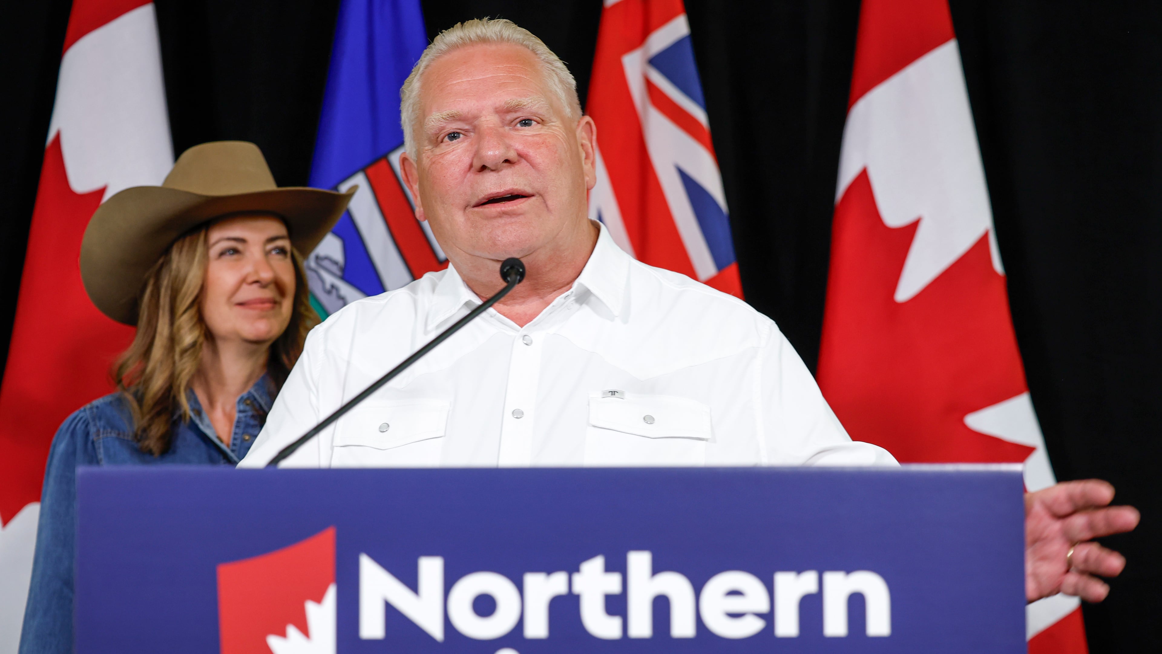 Ontario Premier Doug Ford and Alberta Premier Danielle Smith, left, announce the Northern Shield pipeline proposal in Calgary, Canada, Monday, July 6, 2026. (Jeff McIntosh/The Canadian Press via AP)