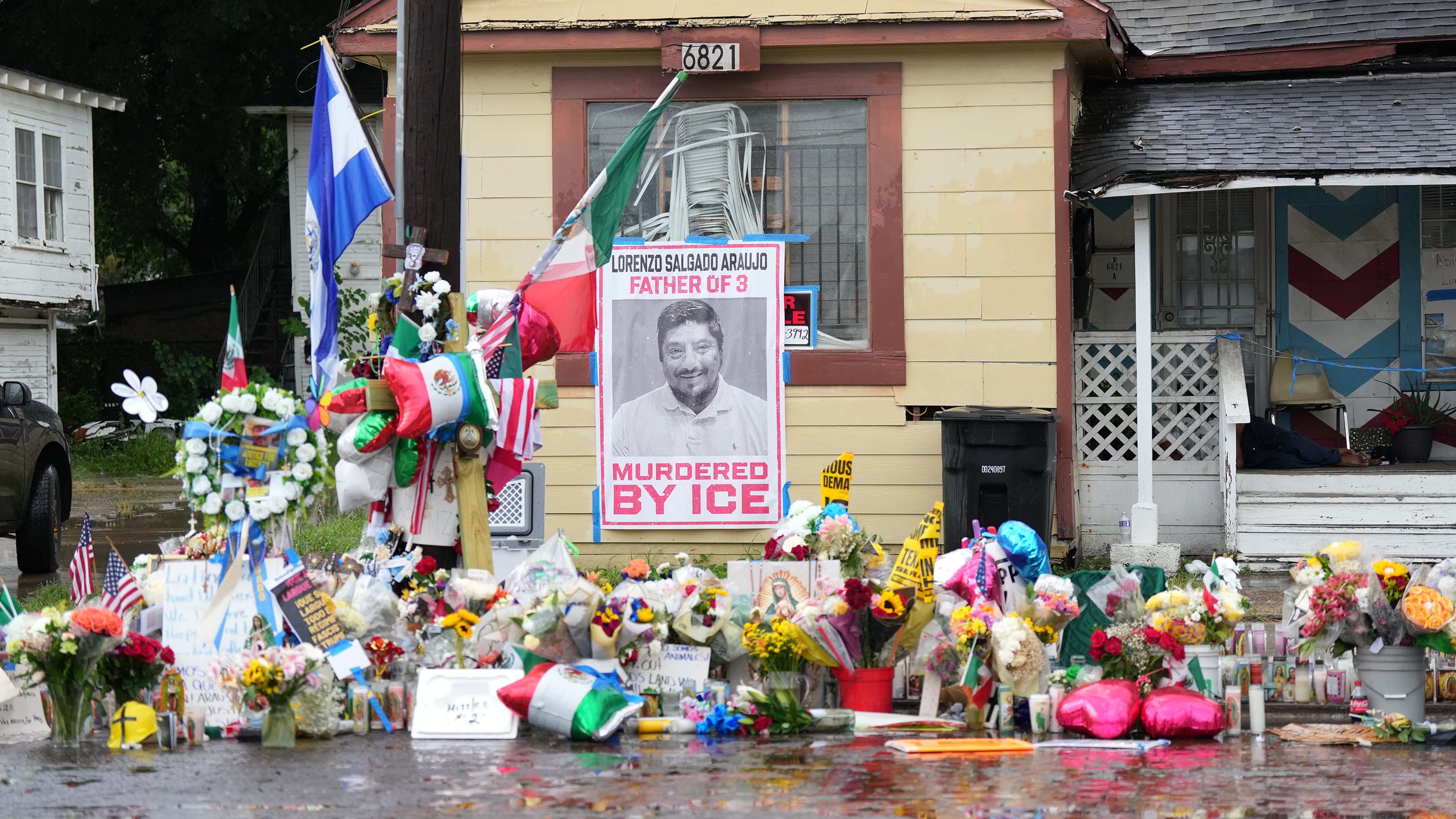 A growing memorial at the site where Lorenzo Salgado Araujo was fatally shot by ICE agents last week, is seen Monday, July 13, 2026, in Houston. (AP Photo/Karen Warren)