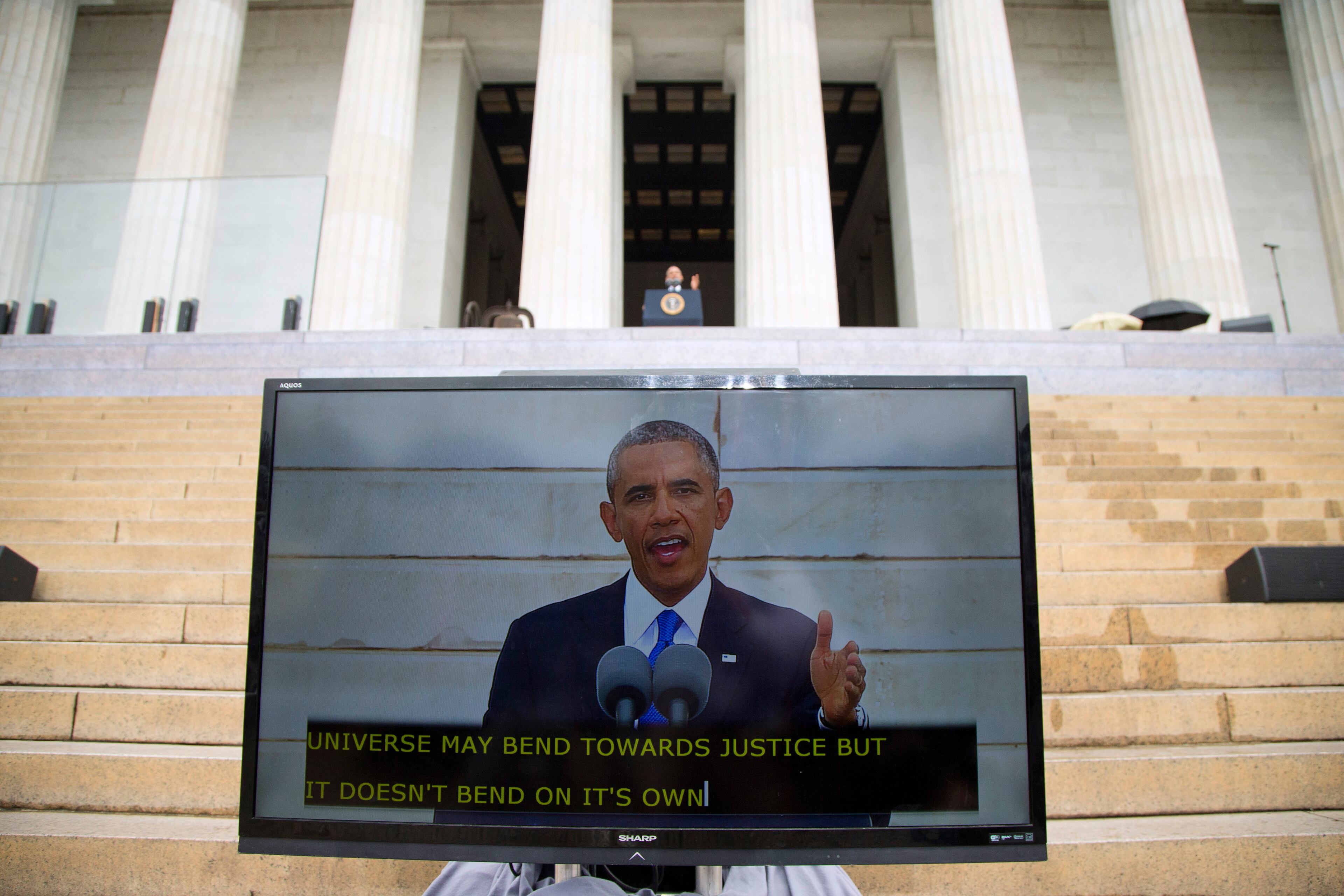 President Barack Obama gestures during remarks at a ceremony commemorating the 50th anniversary of the March on Washington, Wednesday, Aug. 28, 2013, at the Lincoln Memorial in Washington. The president was set to lead civil rights pioneers Wednesday in a ceremony for the 50th anniversary of the March on Washington, where Dr. Martin Luther King's "I Have a Dream" speech roused the 250,000 people who rallied there decades ago for racial equality. (AP Photo/Evan Vucci)