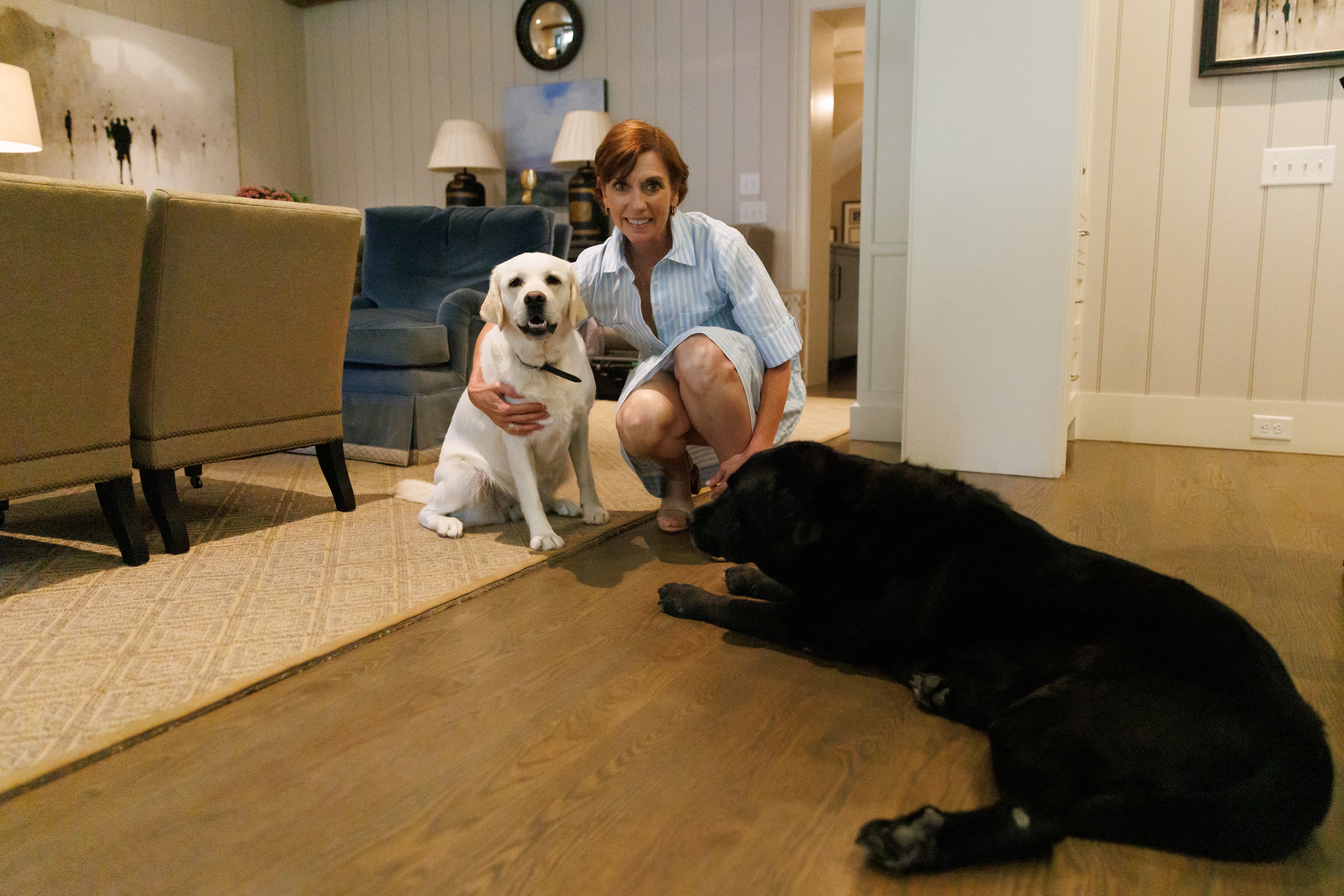 Brittain Prigge with her dogs, Mae (left) and Belle, on Tuesday, May 26, 2026. (Estela Muñoz/AJC)
