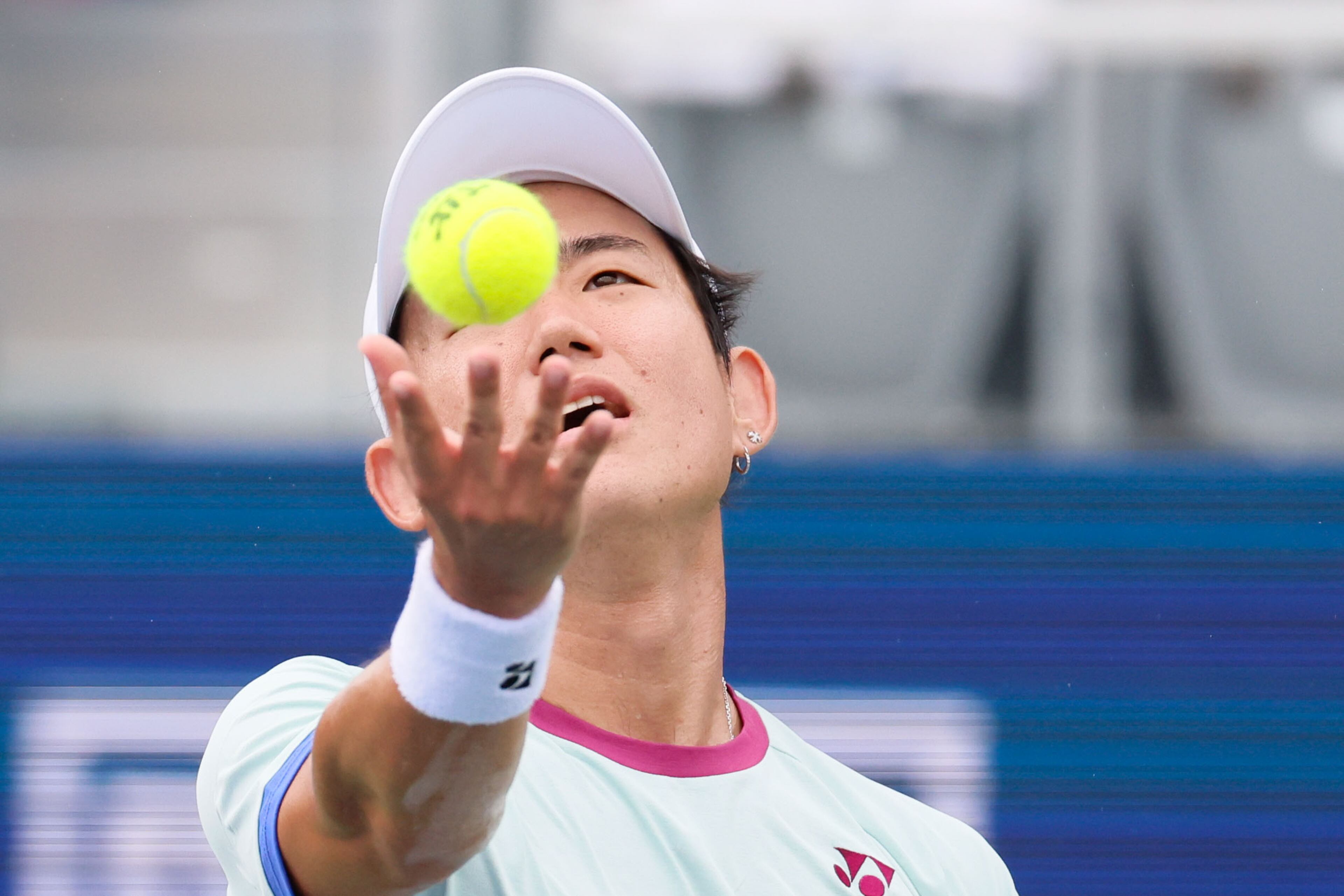 Japan’s Yoshihito Nishioka toses the ball for a serve for a return during a final match at the 2024 Atlanta Tennis Open at Atlantic Station on Sunday, July 28, 2024, in Atlanta.
(Miguel Martinez / AJC)