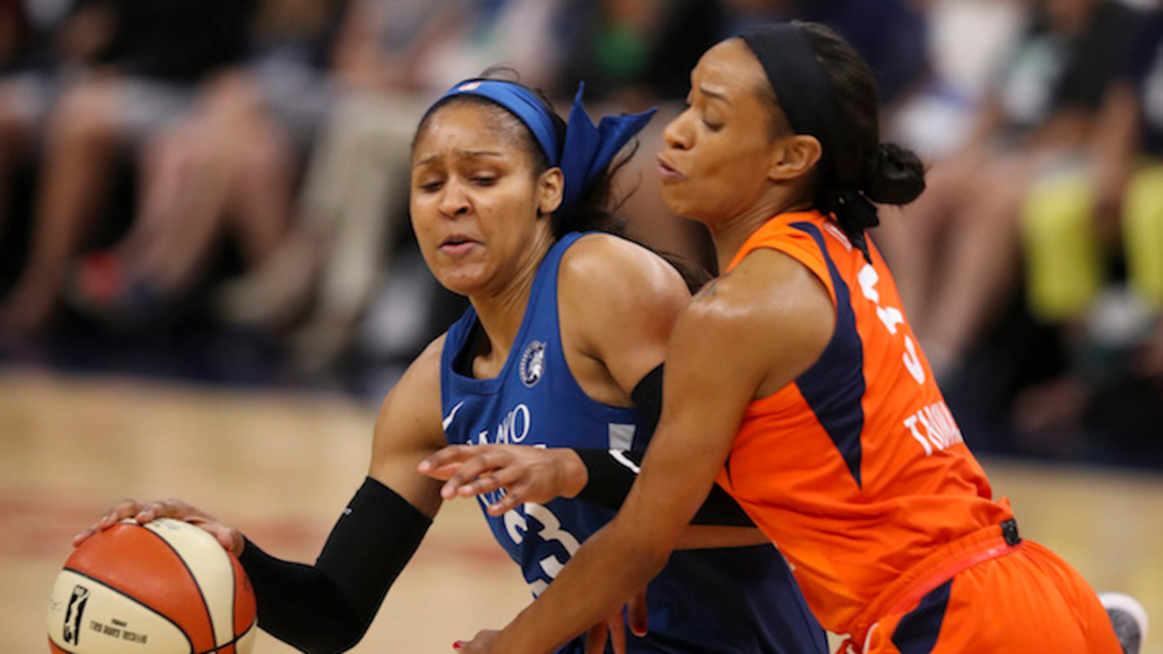 Minnesota Lynx forward Maya Moore (23) tries to drive around Connecticut Sun guard Jasmine Thomas (5) in the first quarter on Sunday, July 15, 2018 at Target Center in Minneapolis, Minn. (Jeff Wheeler/Minneapolis Star Tribune/TNS)