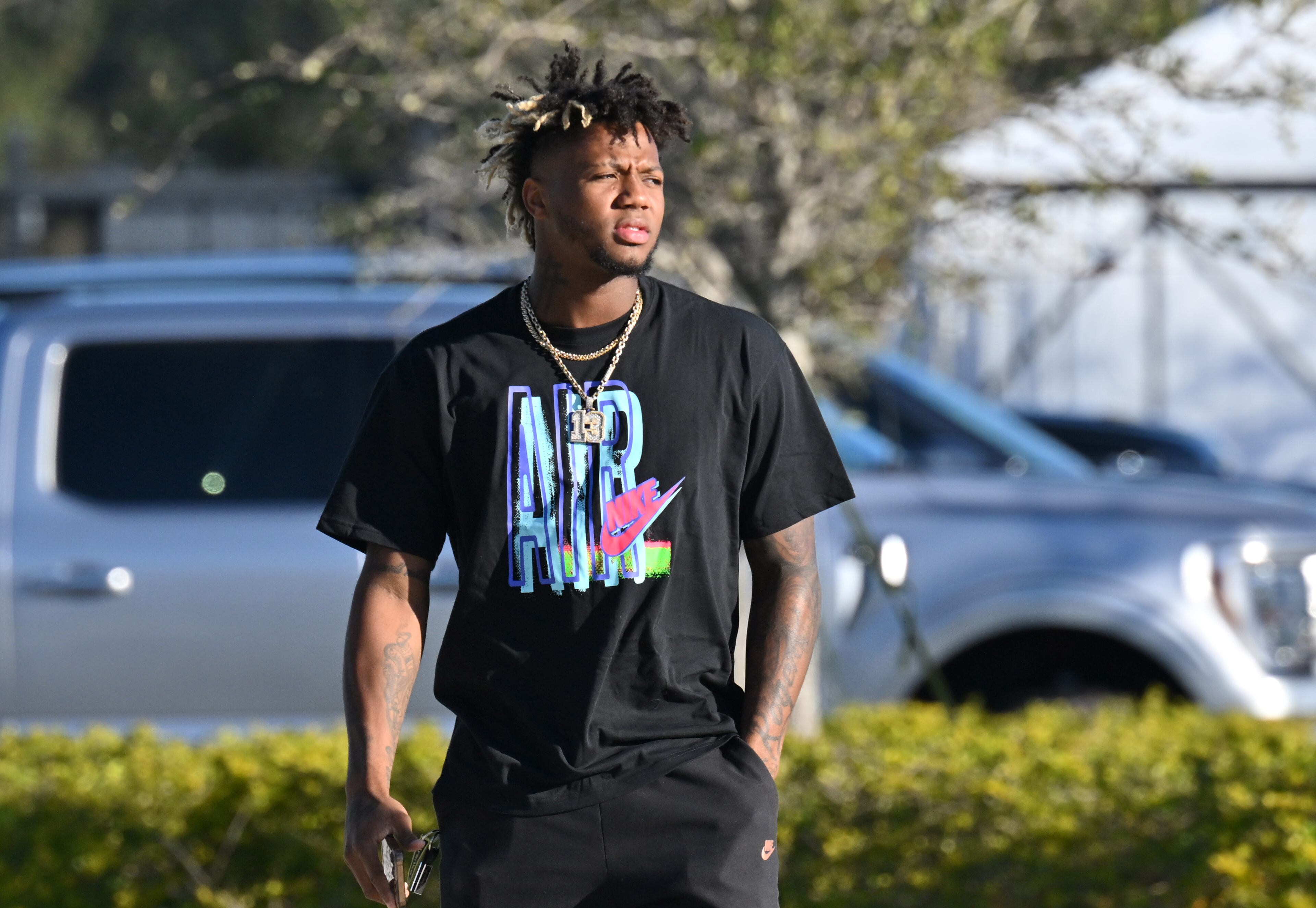 Braves right fielder Ronald Acuna arrives to spring training Tuesday at CoolToday Park in North Port, Florida. (Hyosub Shin / Hyosub.Shin@ajc.com)