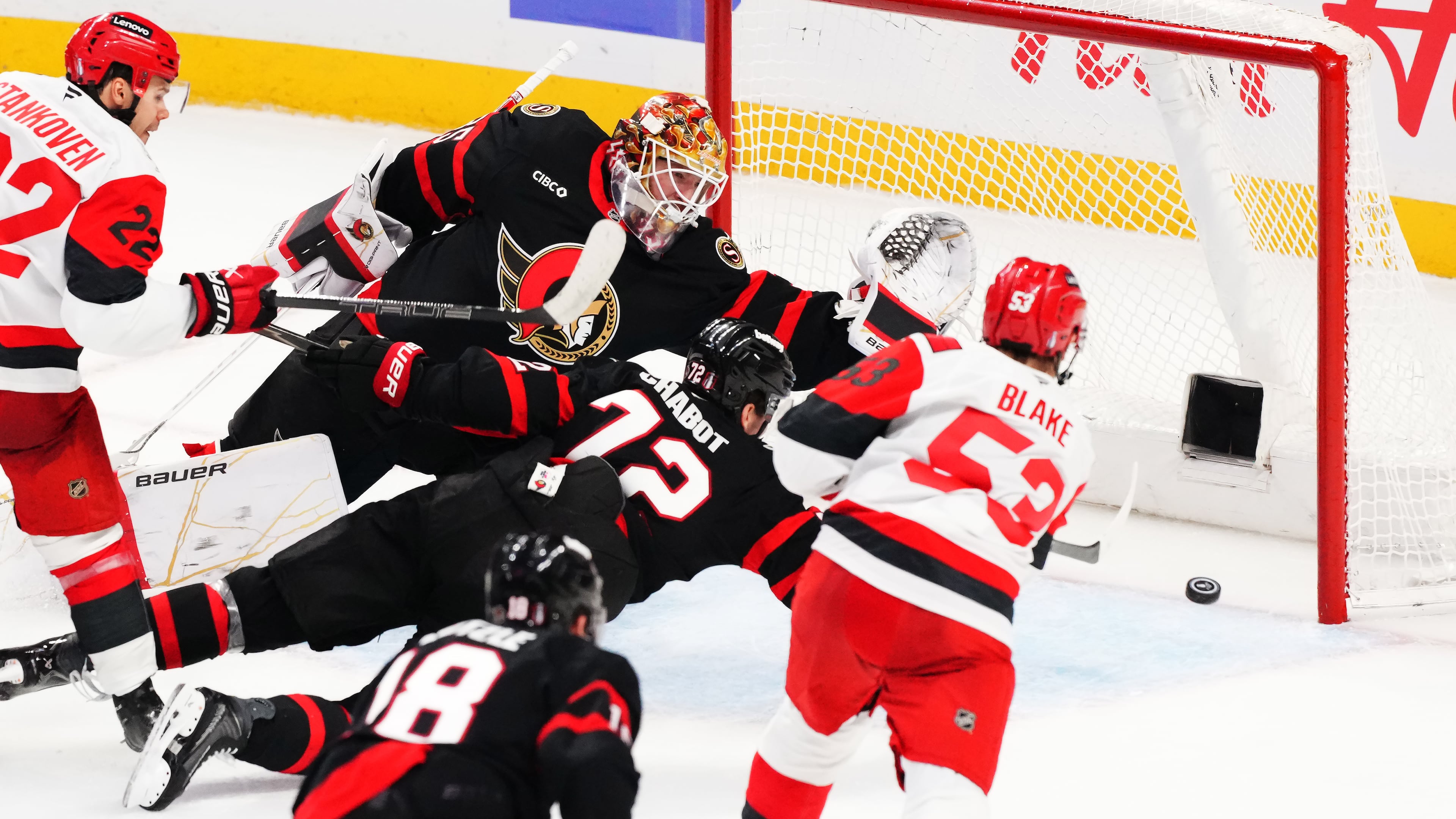 Carolina Hurricanes' Jackson Blake (53) scores on Ottawa Senators goaltender Linus Ullmark (35) as Senator's Thomas Chabot (72) defends during the second period of an NHL hockey playoff game in Ottawa, Ontario, Thursday, April 23, 2026. (Sean Kilpatrick/The Canadian Press via AP)