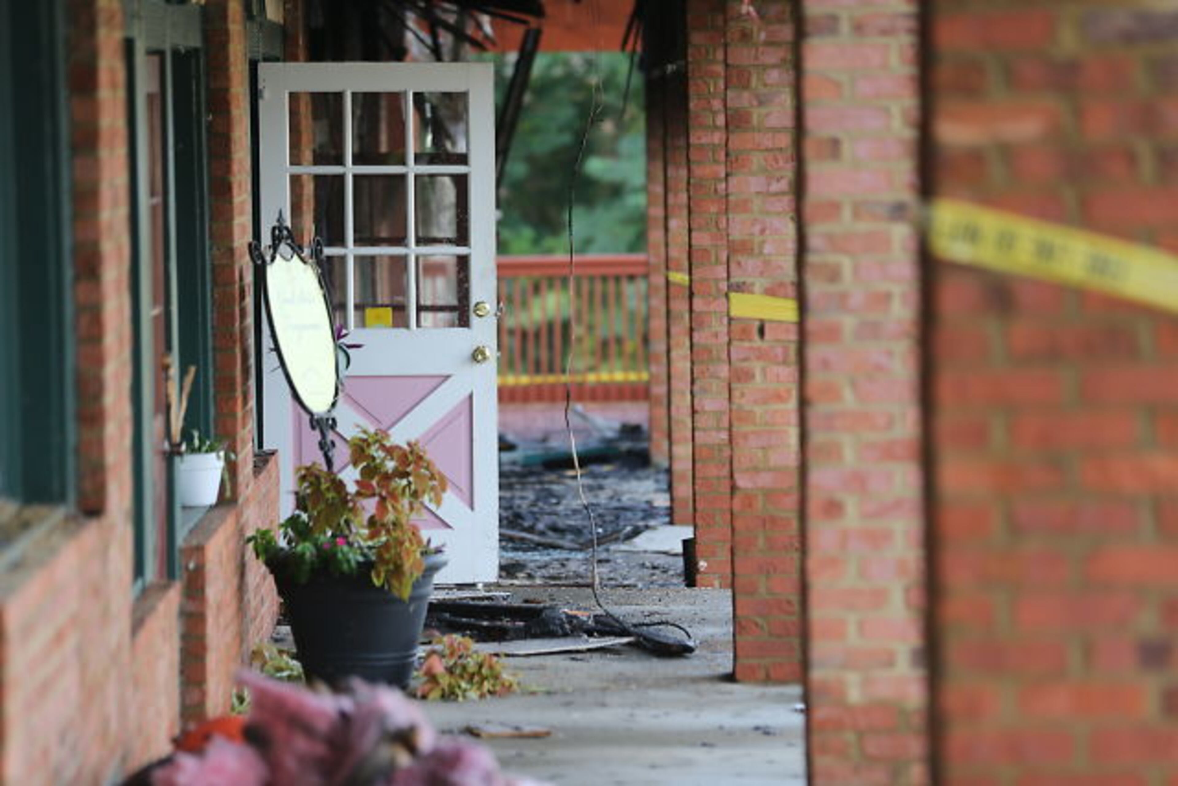 Seventeen dogs at a pet spa survived a DeKalb strip mall fire, but a Cocker Spaniel and a Shih Tzu died from smoke inhalation. JOHN SPINK / JSPINK@AJC.COM