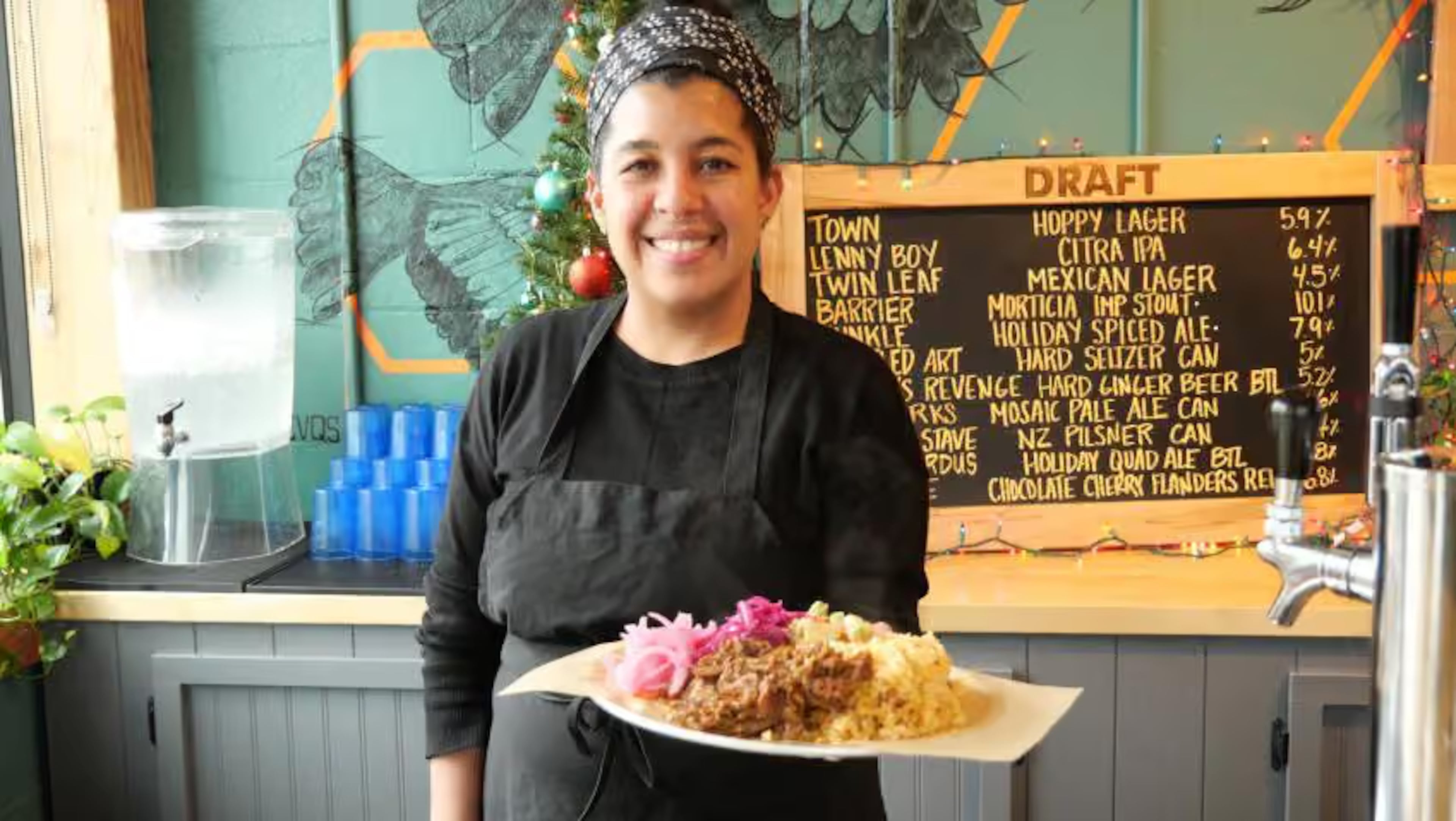 Little Chango restaurant in Asheville, which earned a Bib Gourmand designation from the Michelin Guide of the American South, serves casual Latin American fare. Pictured is chef Iris Rodriguez. (Courtesy of Explore Asheville)