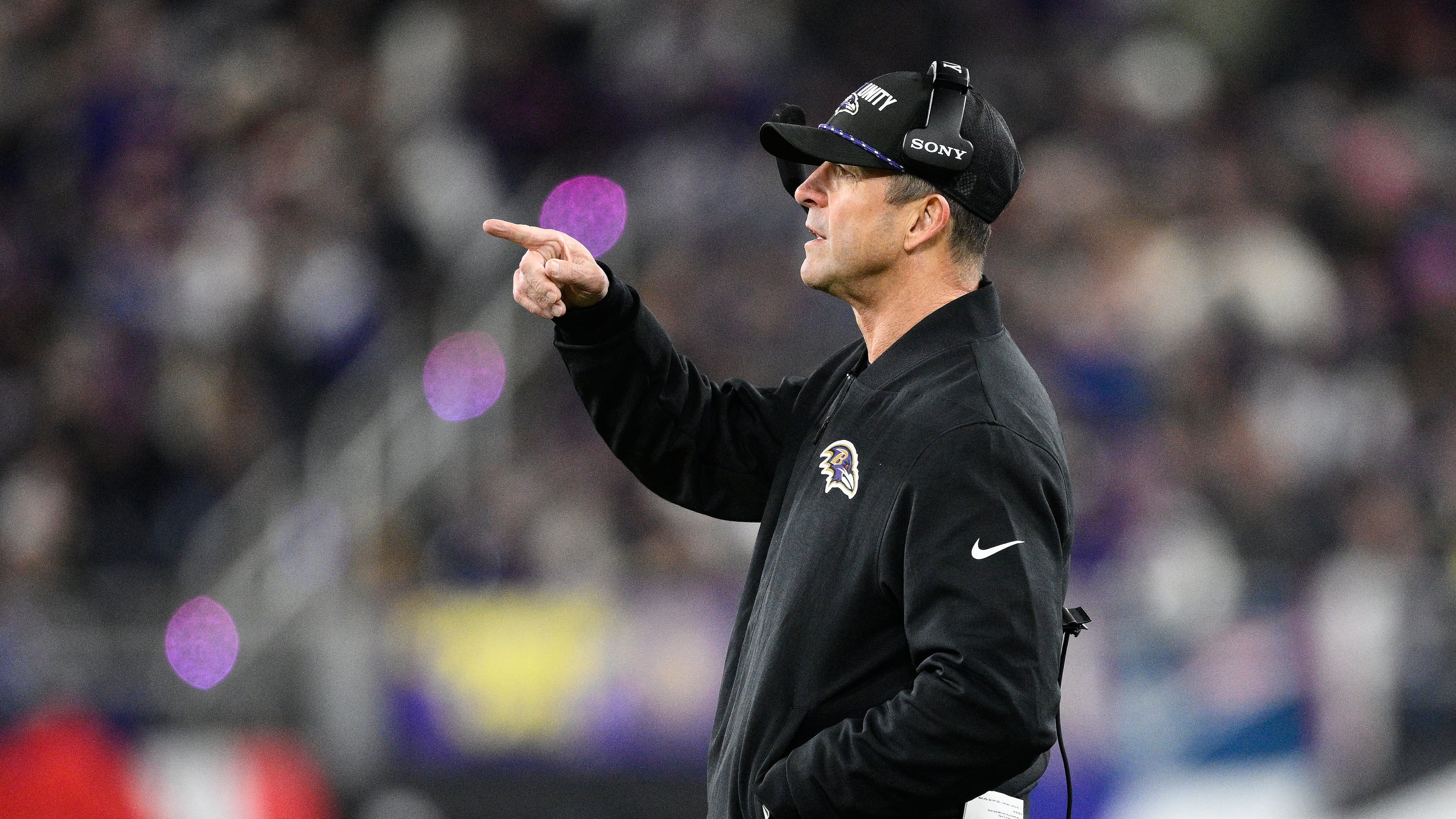Baltimore Ravens head coach John Harbaugh gestures during the first half of an NFL football game against the New England Patriots, Sunday, Dec. 21, 2025, in Baltimore. (AP Photo/Nick Wass)