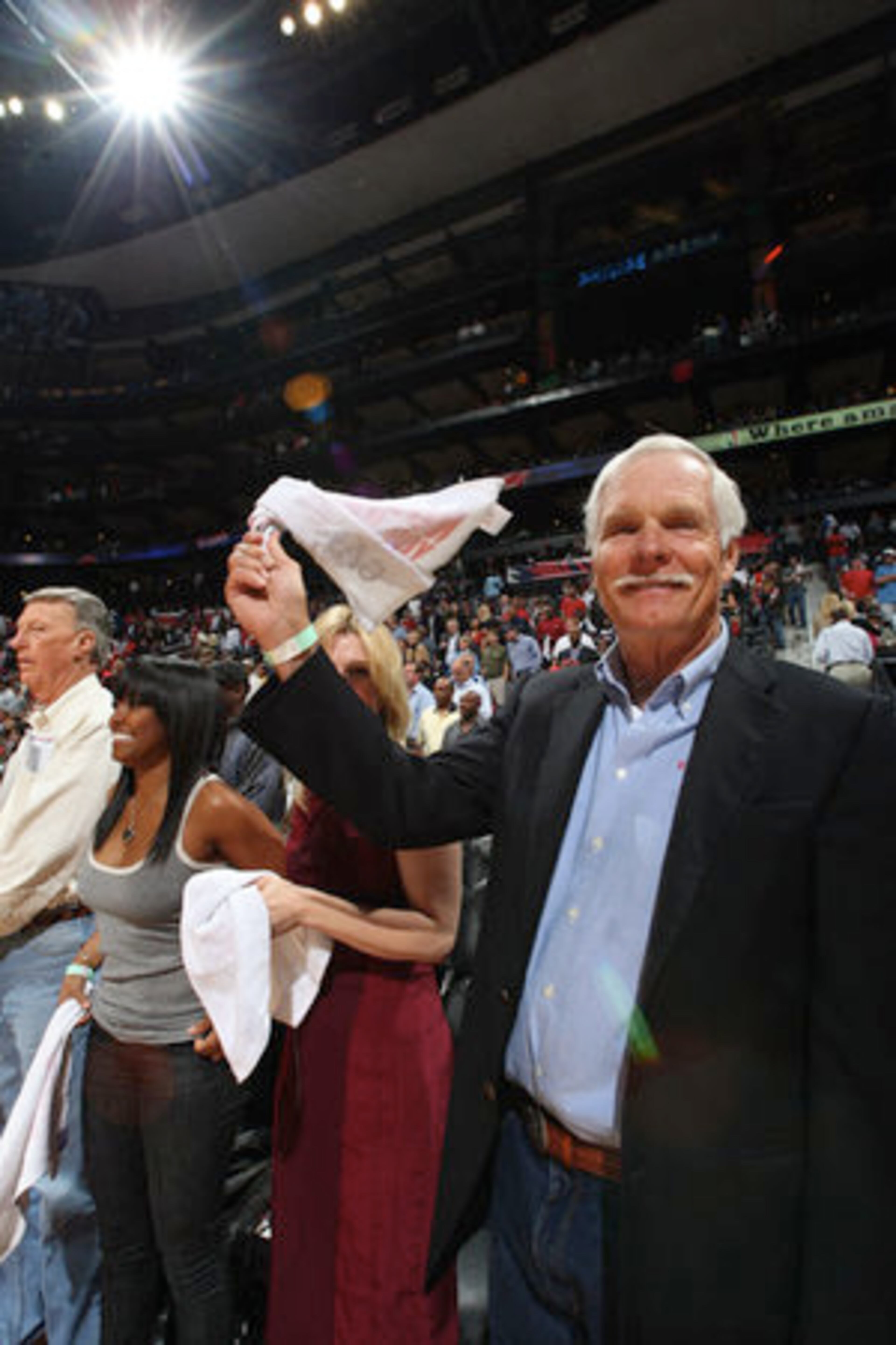 Ted Turner, former owner of the Atlanta Hawks, cheers before the start of the Eastern Conference quarterfinals opener between the Hawks and Miami Heat at Philips Arena.